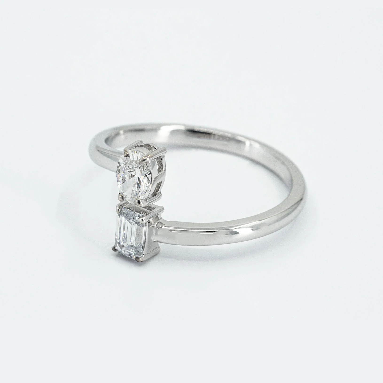 Oval-Emerald Crossover Ring
