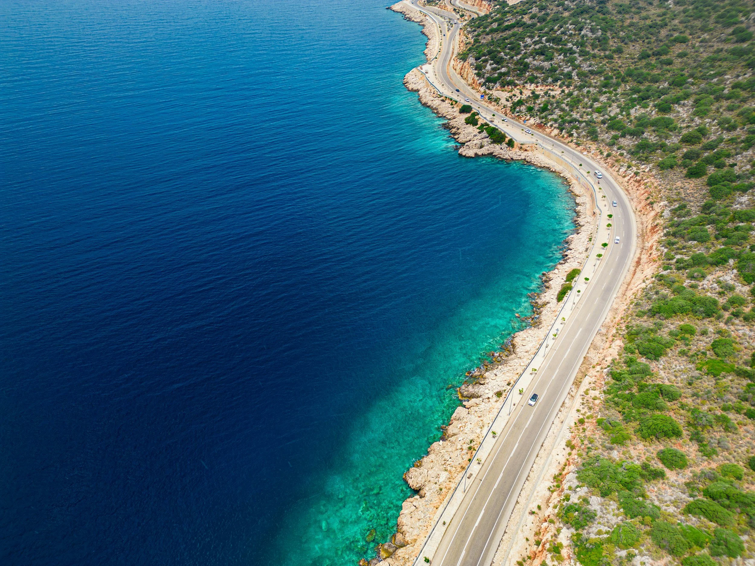 Seaside village of Kas Turkey with clear water and relaxed atmosphere, often preferred for calm recovery focused travel.