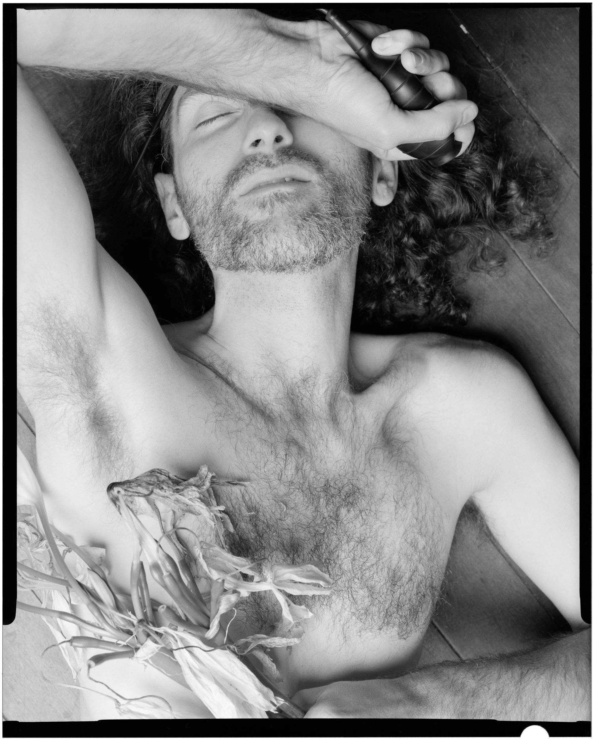 Self-portrait with dying flowers