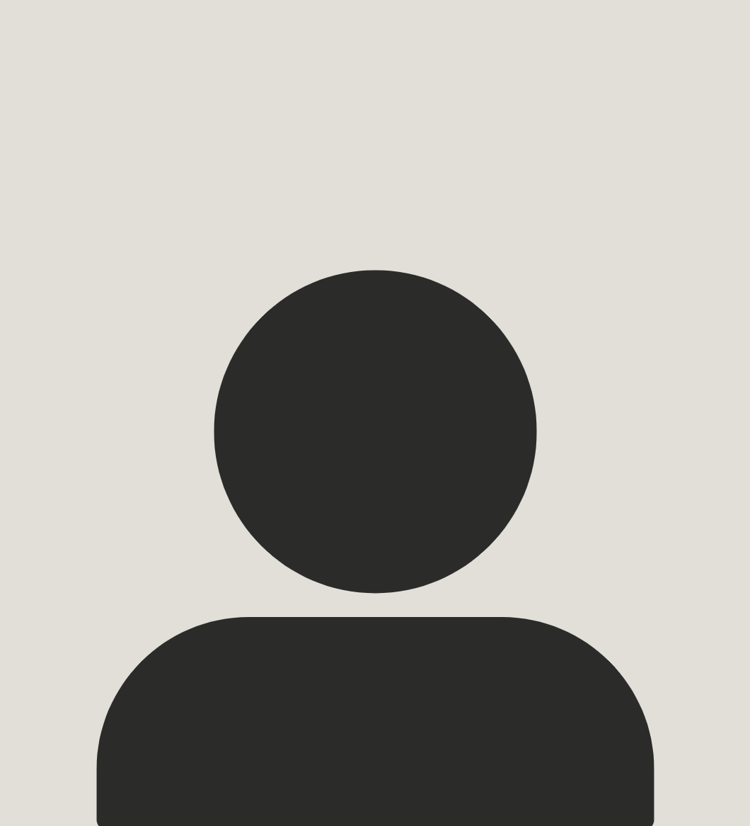 Silhouette of a person with short hair on a plain light background.