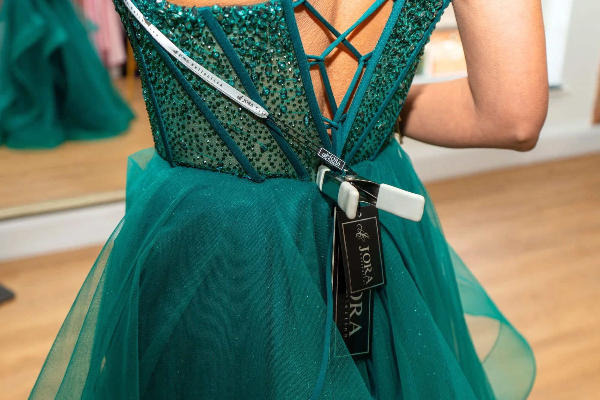 Green Jora dress with clips making it fit properly