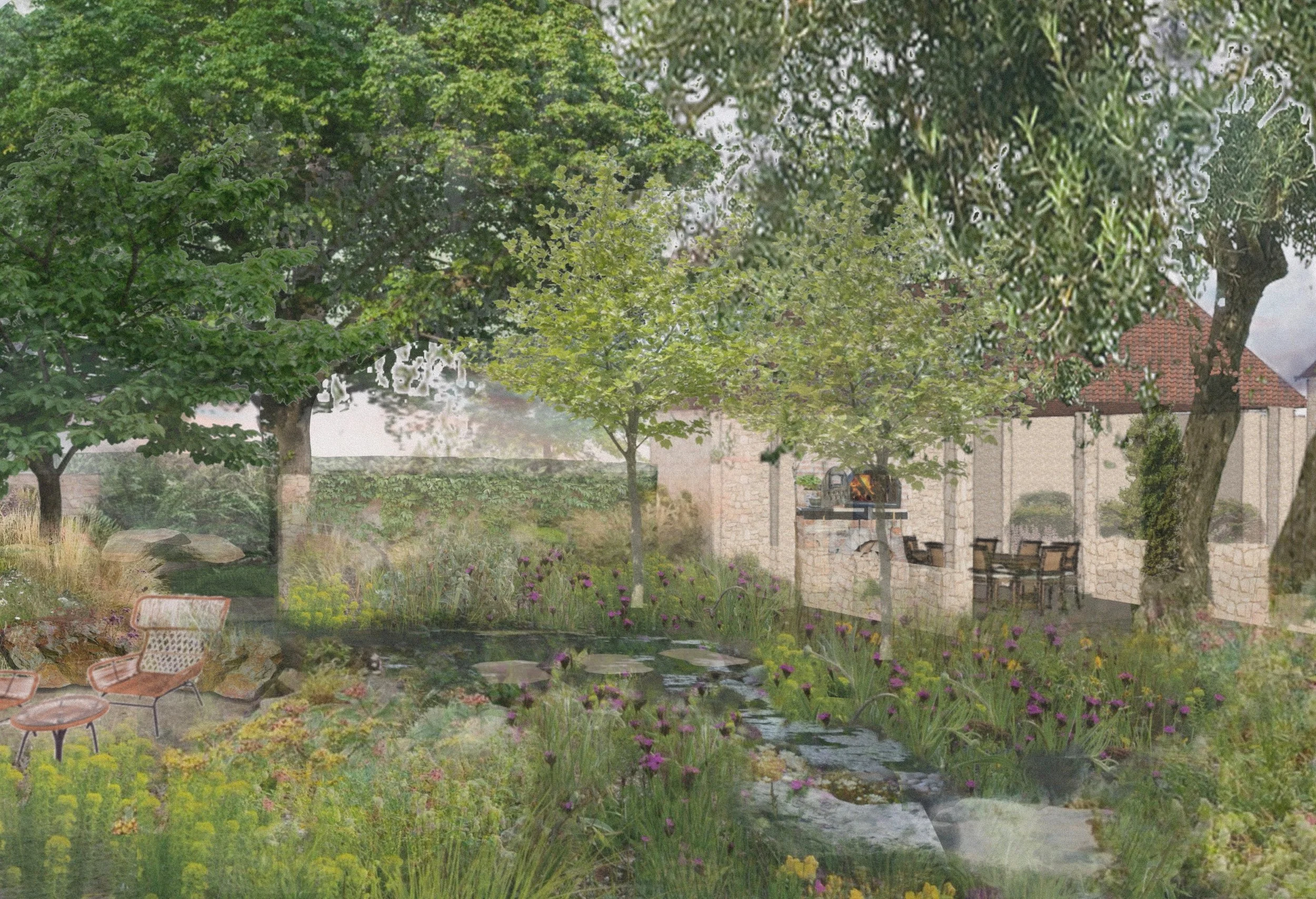 A lush backyard garden with mature trees, a stone pathway, blooming flowers, a pond, and patio furniture, with a stone house and outdoor fireplace in the background.