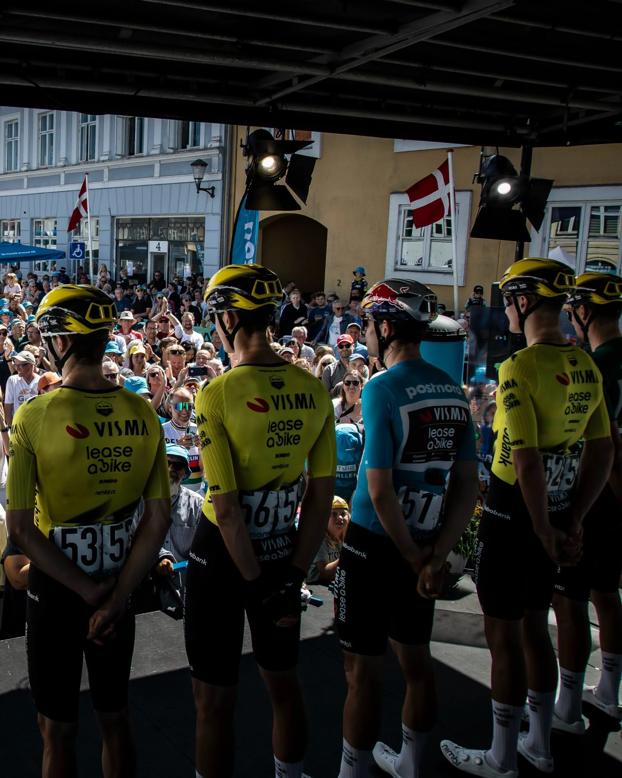 Team Visma Lease a bike, Ashlin Barry, Wout Van Aert on the podium at the 2026 Tour of Denmark.