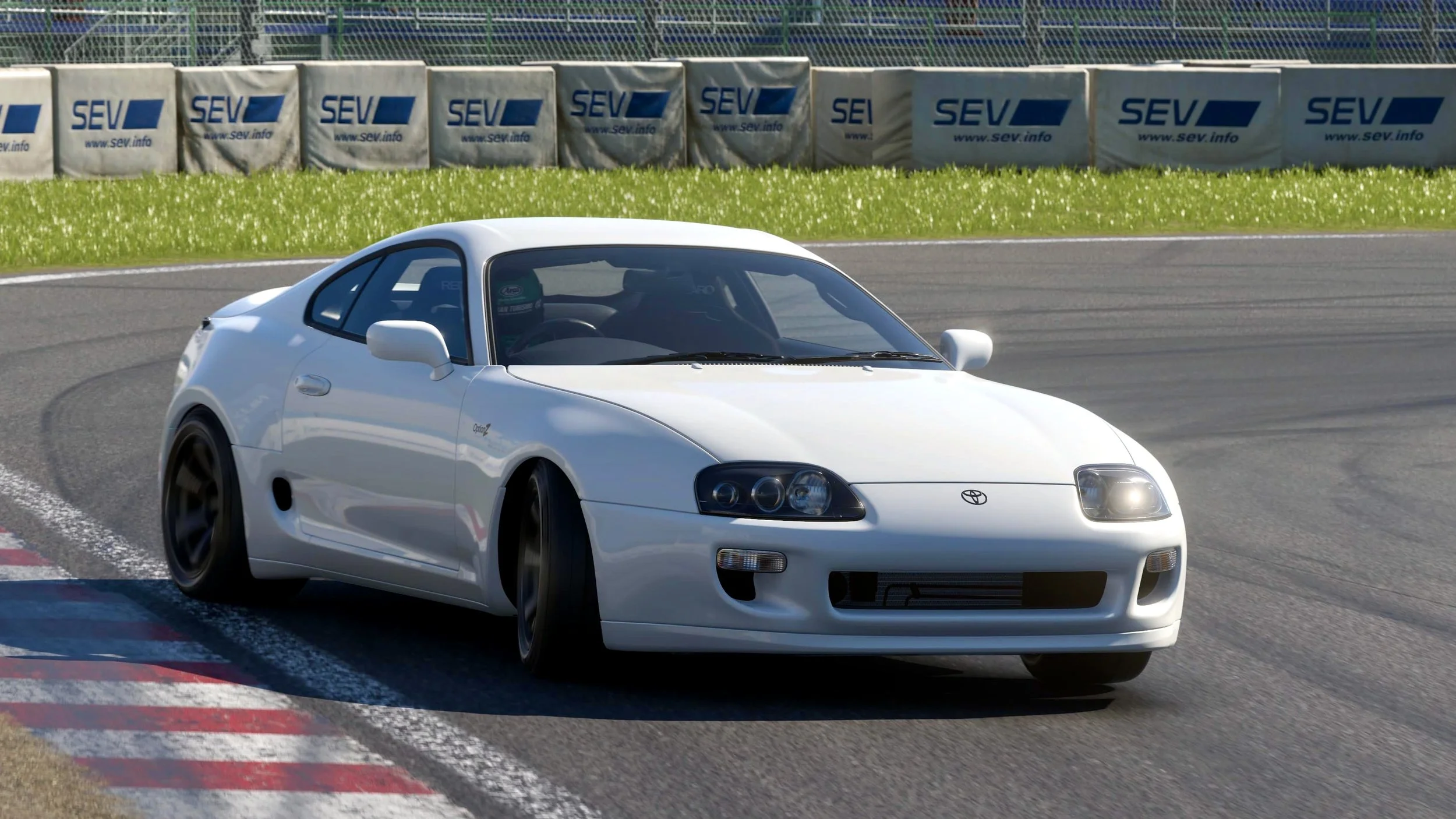 The OptionZ Supra in Ghost White at Tsukuba Circuit