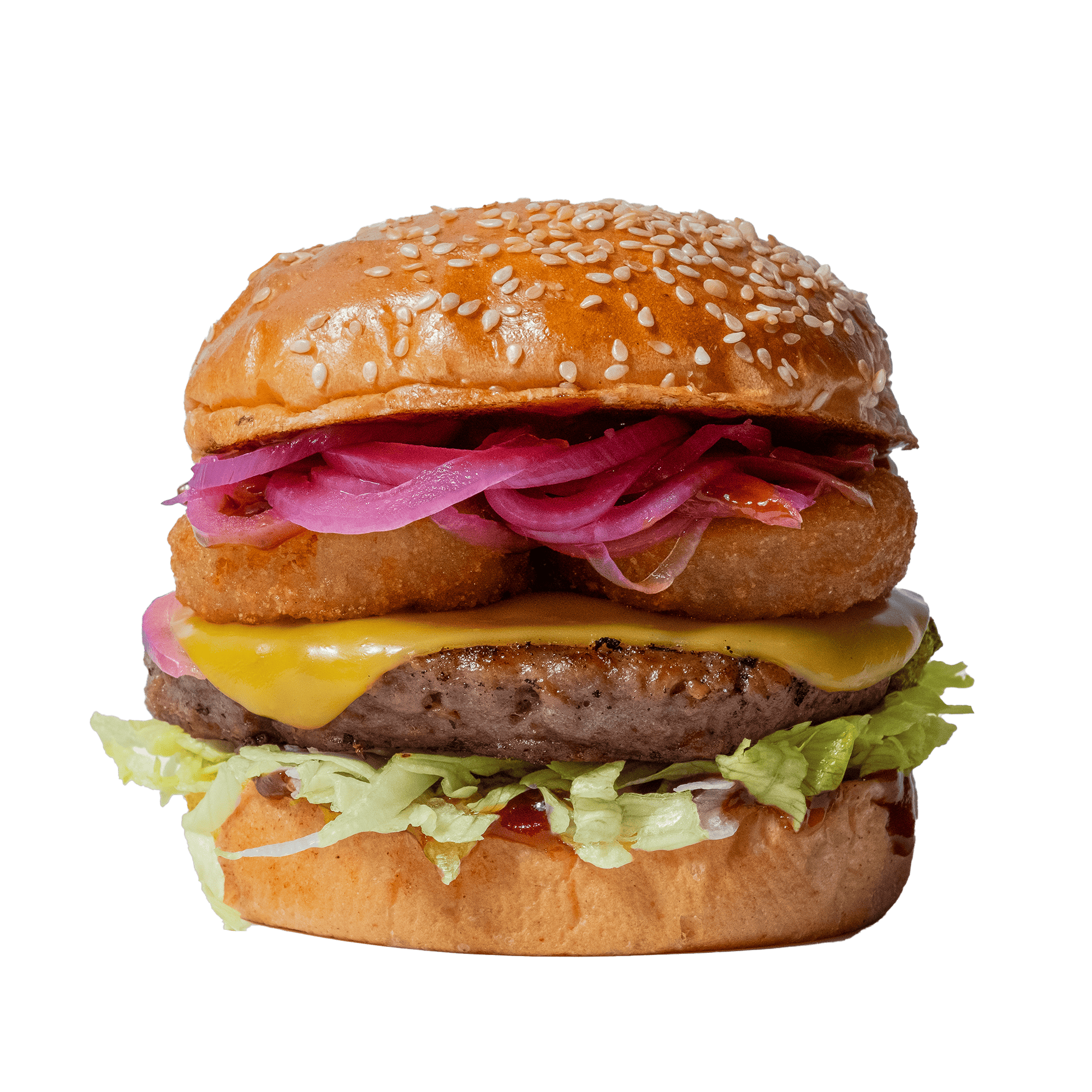 Burger with vegan cheese, beyond meat patty, pickled red onions, lettuce, barbeque sauce and a sesame bun.