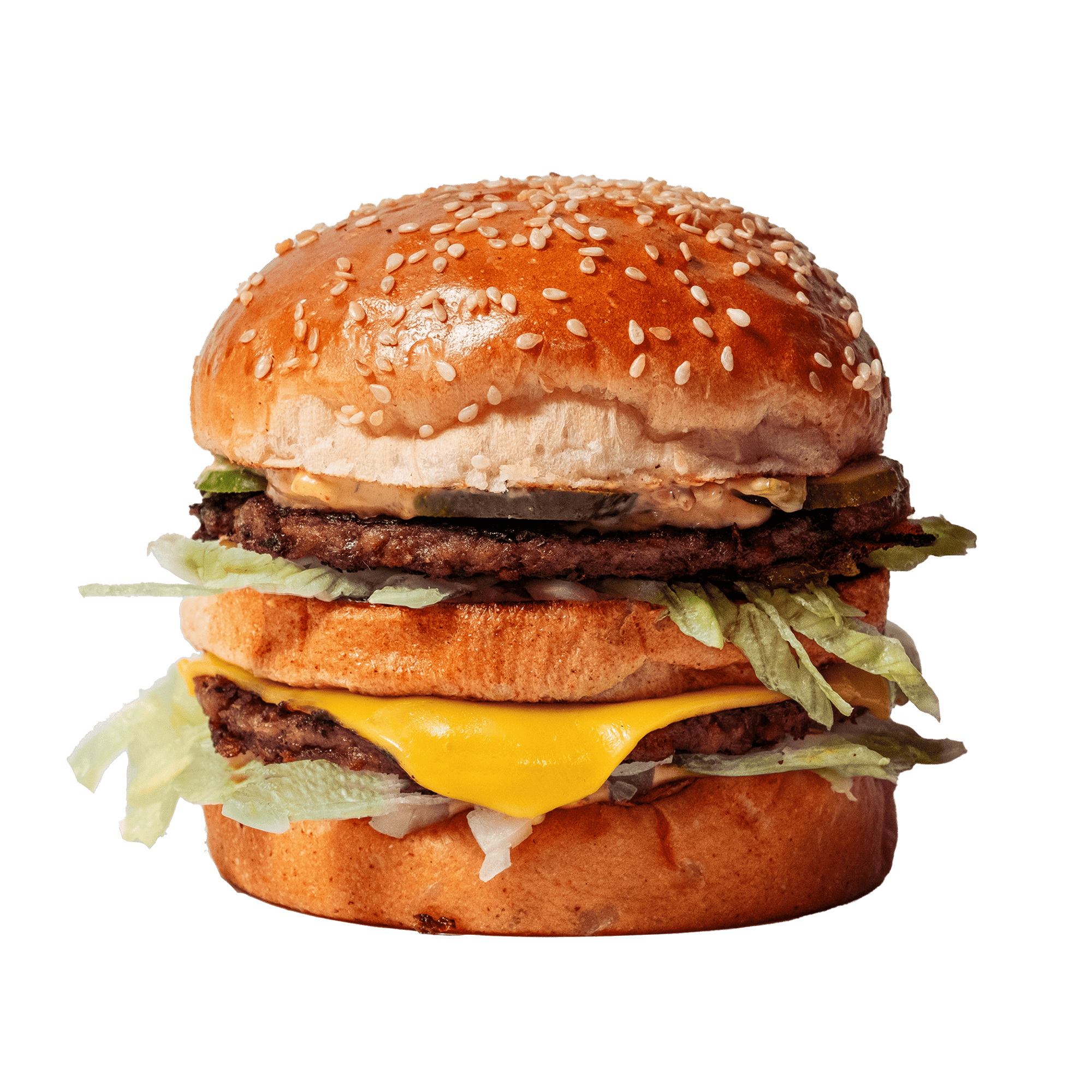 A double decker burger with vegan cheese.