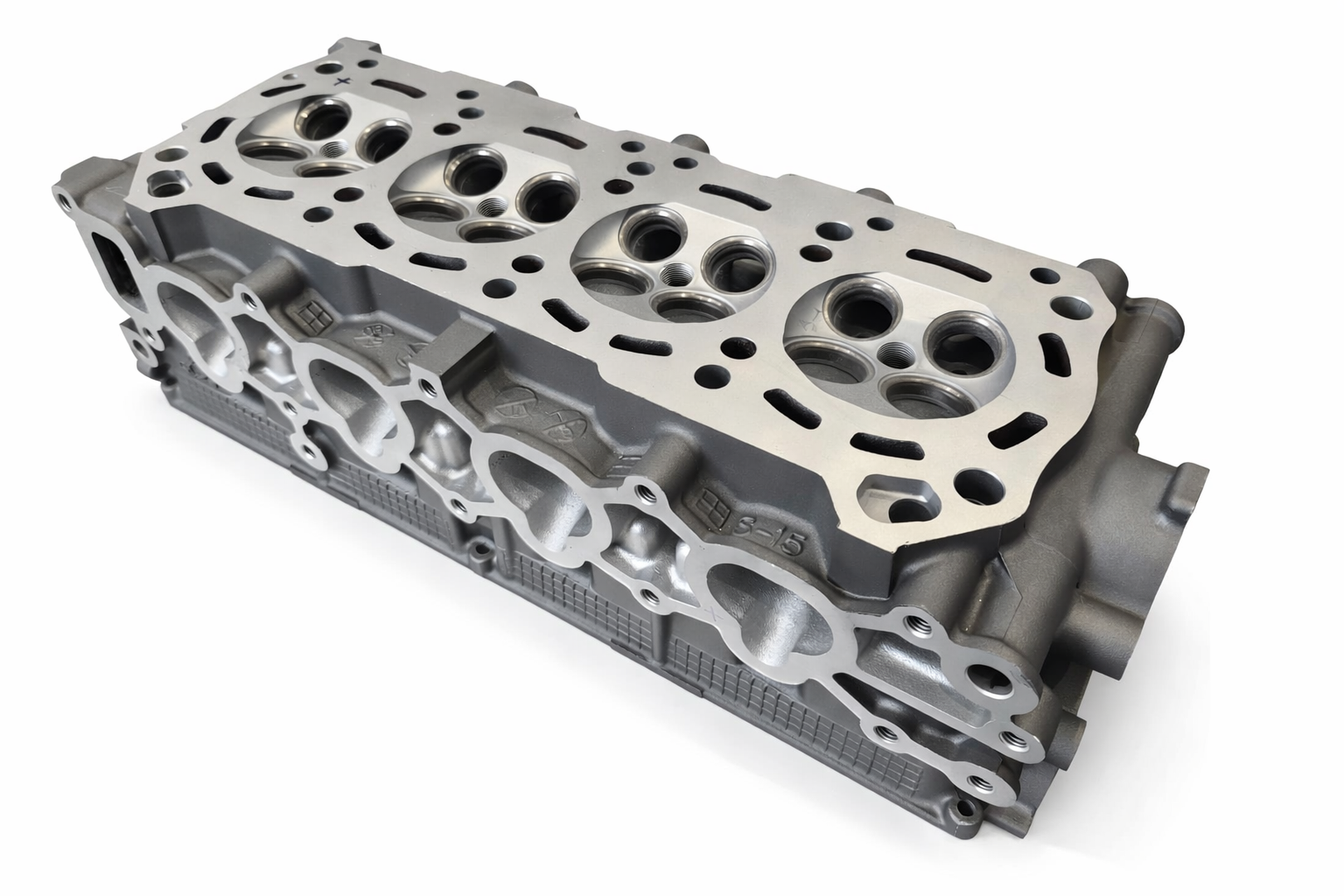 A metal engine cylinder head.