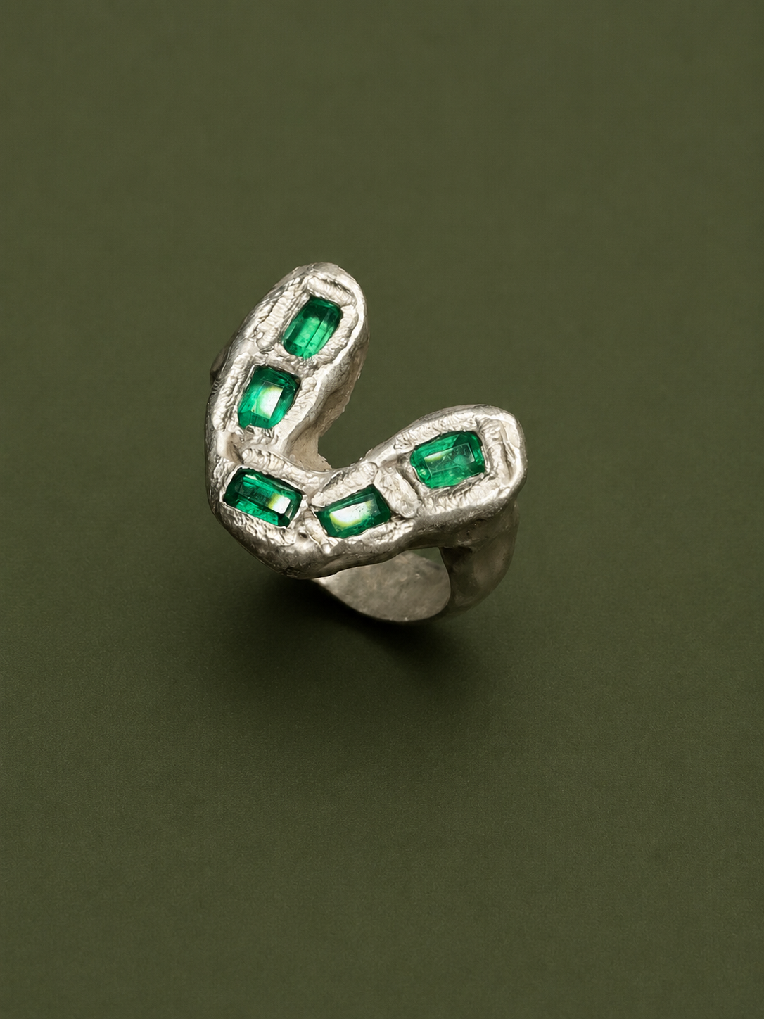 Raw silver ring + 5 emeralds