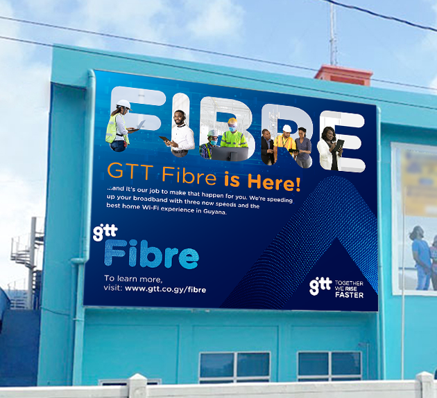 Billboard advertising GTT fiber internet service with images of diverse workers and a blue background.