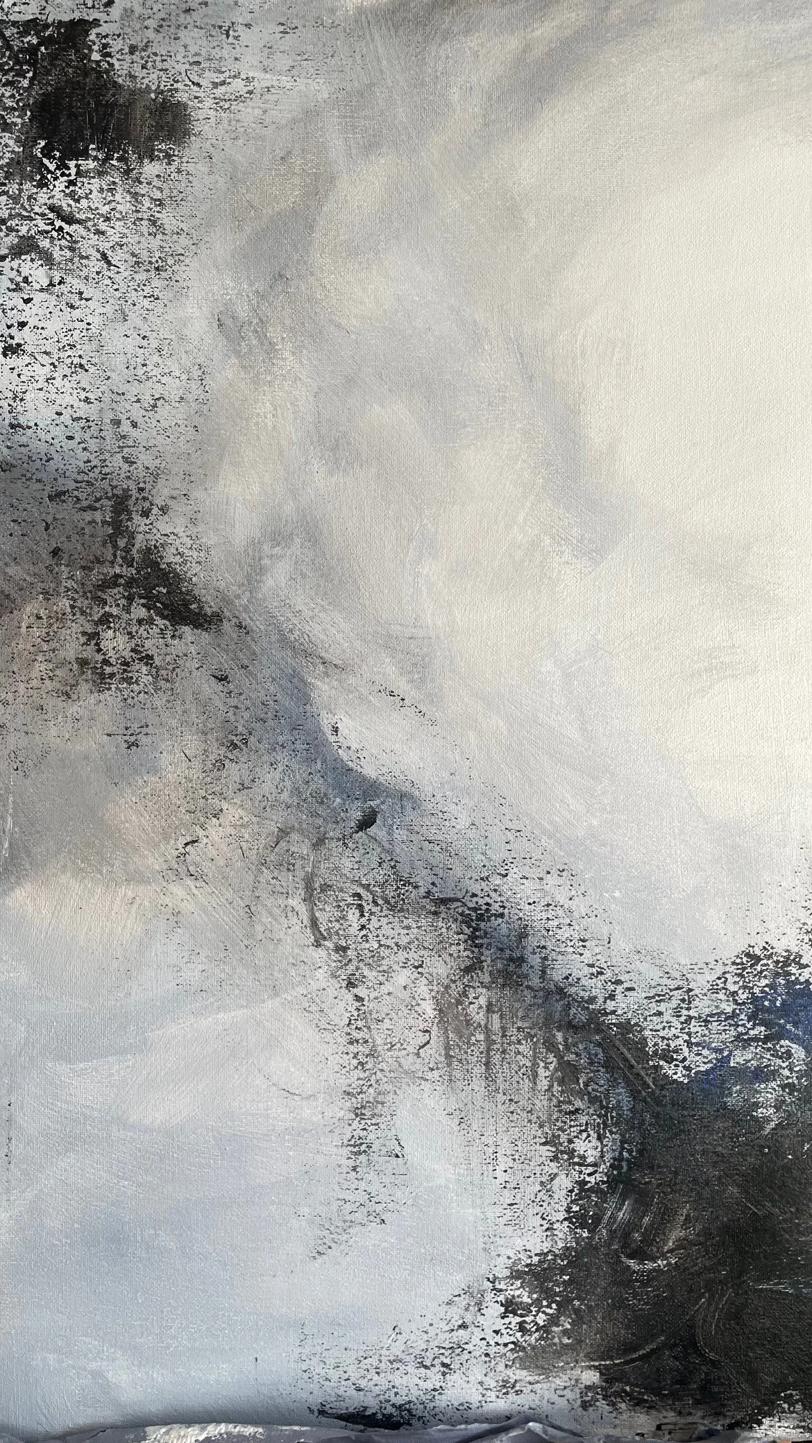 Abstract black and gray textured art with swirling and splattered paint patterns on a light background.