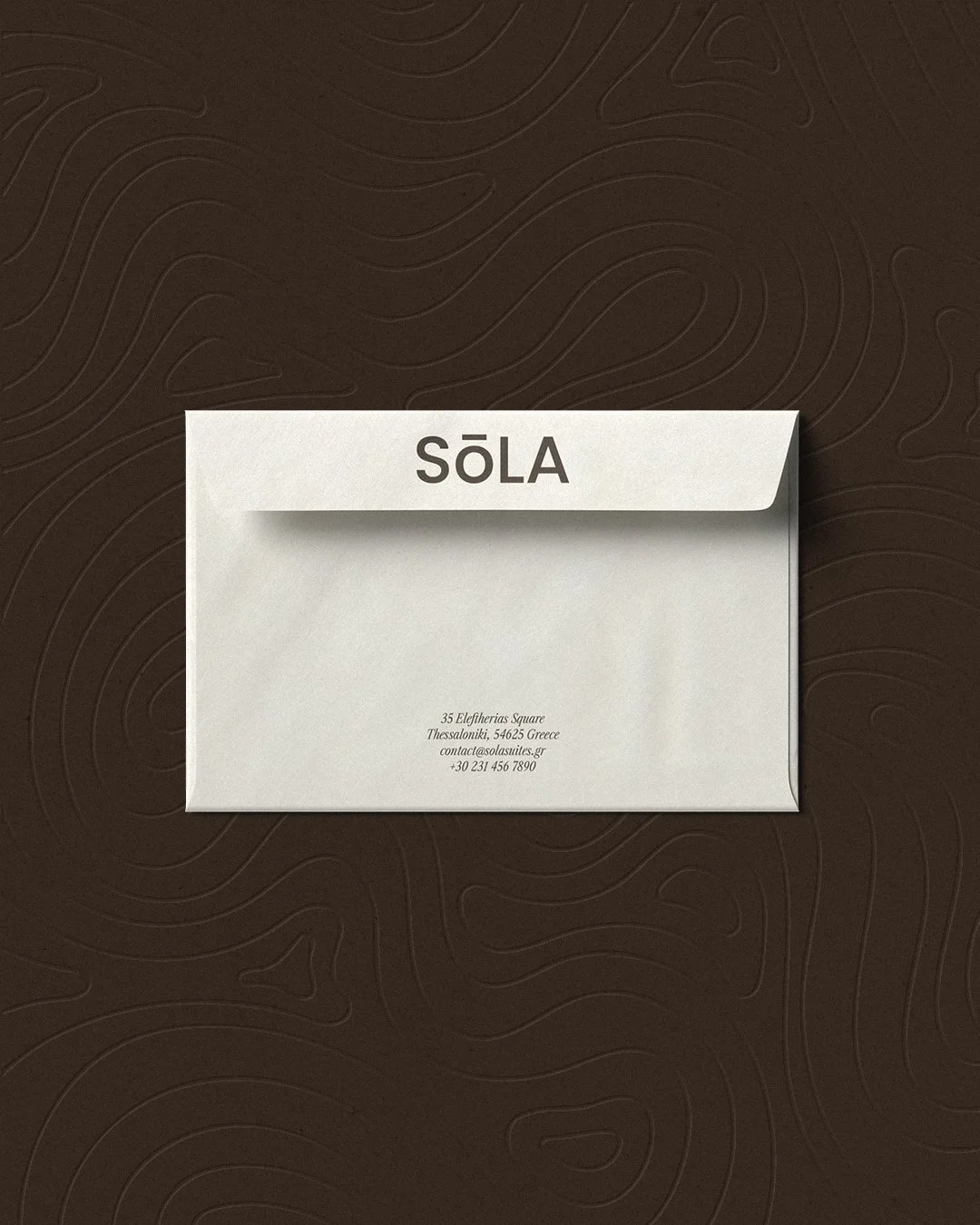 solaapartments_branding_envelopemockup.jpg