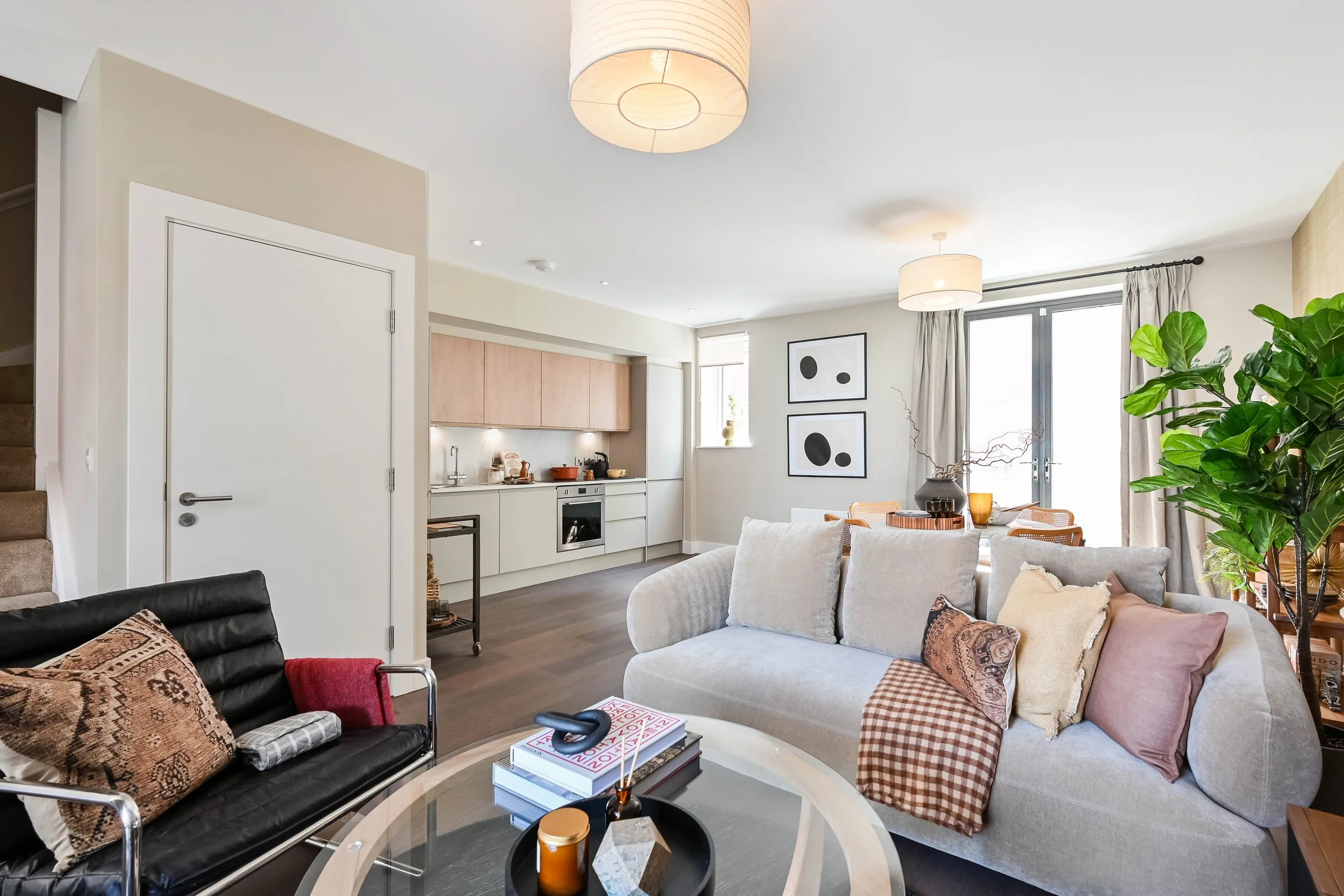 An open plan kitchen and living room in a Fable styled showroom