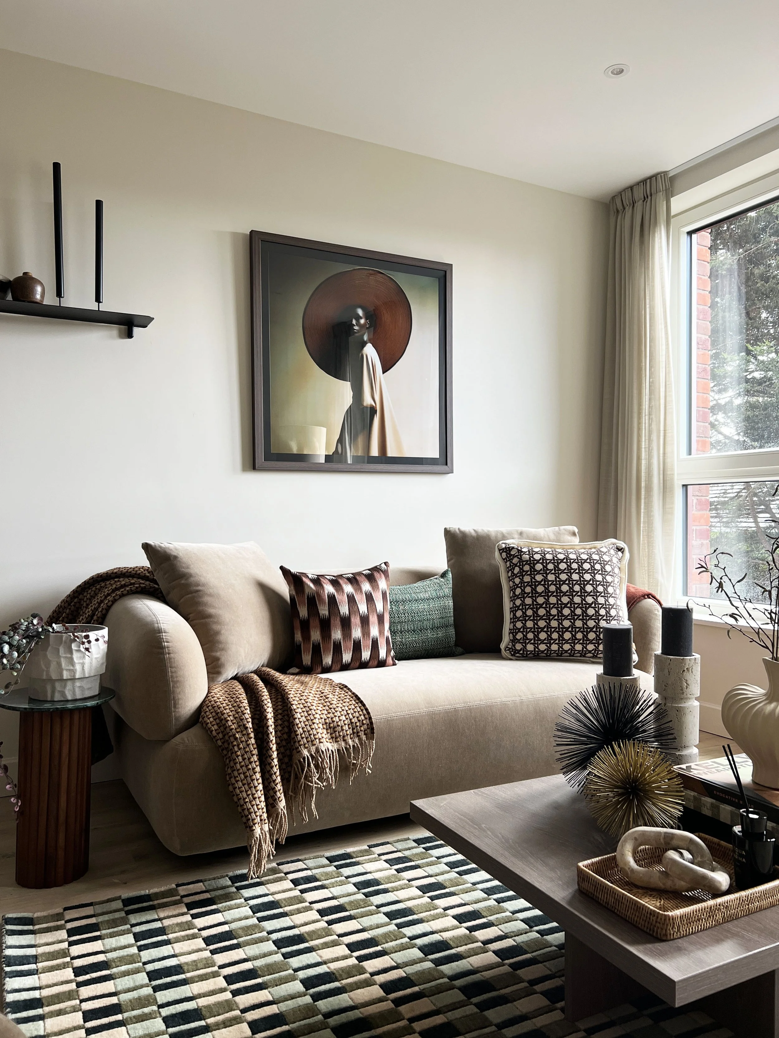 Moody lighting hitting a show home living room