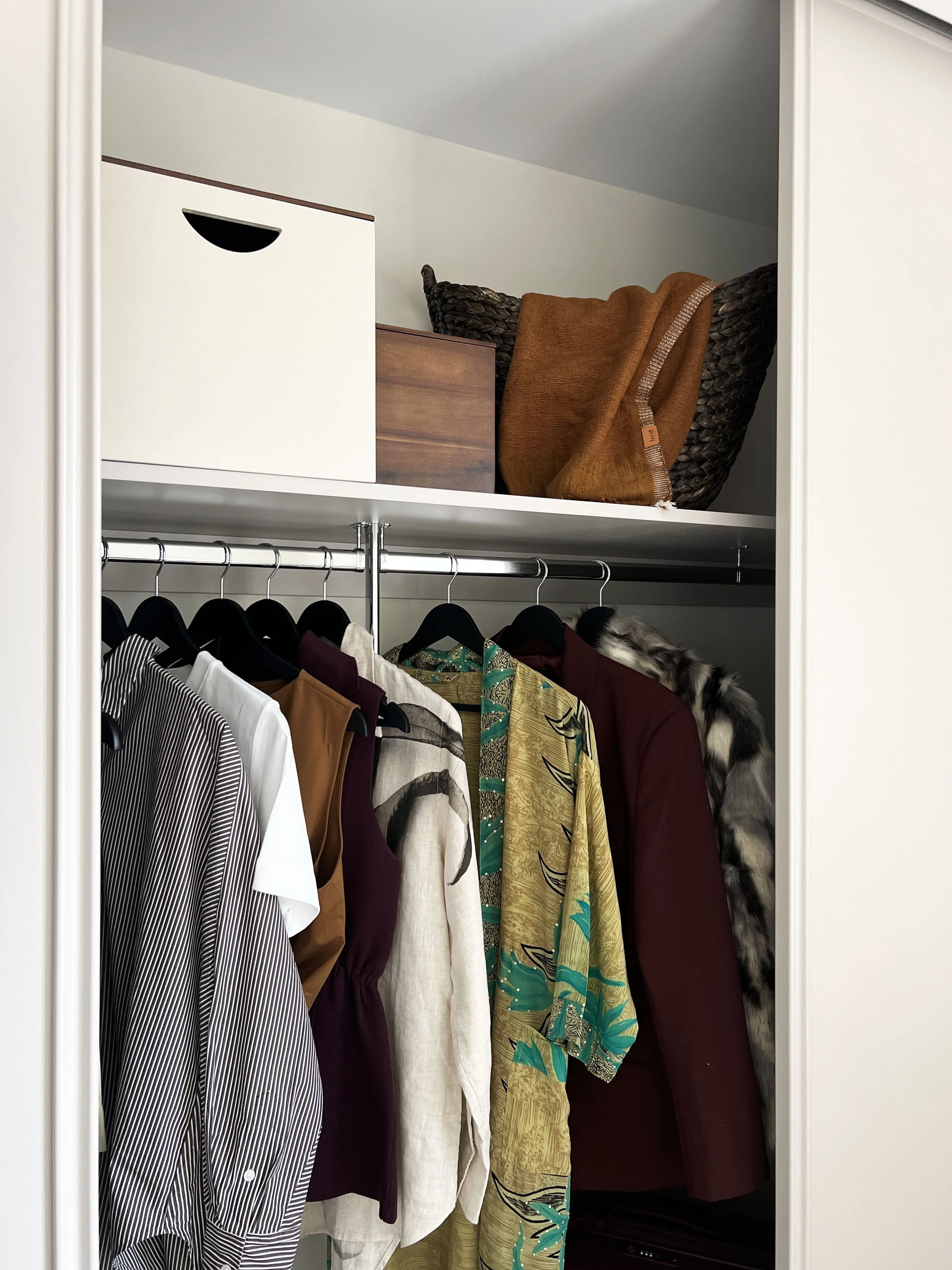 Styling of a show home wardrobe, showcasing luxurious space and bespoke design