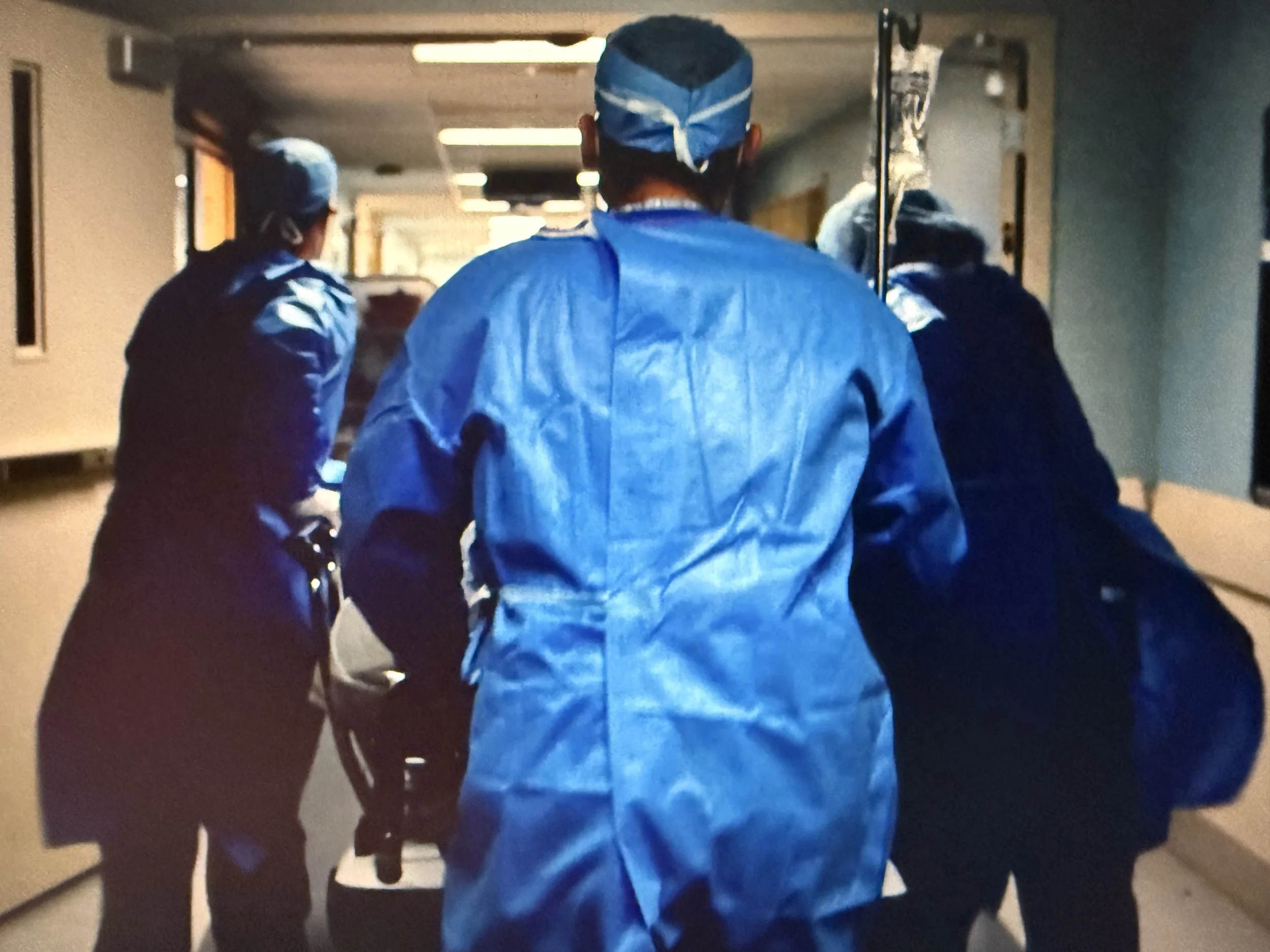 Rushing the patient to the Operating Room.