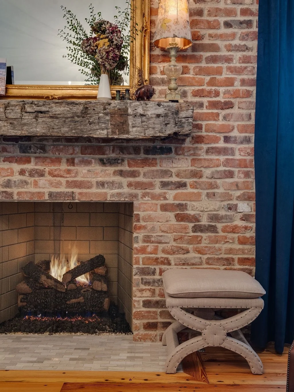 January calls for warm fires.

There&rsquo;s something grounding about a well-worn fireplace; brick, wood, a little age, and a lot of warmth.

Cozy doesn&rsquo;t have to try hard.

Builder: @paulvarneyconstruction