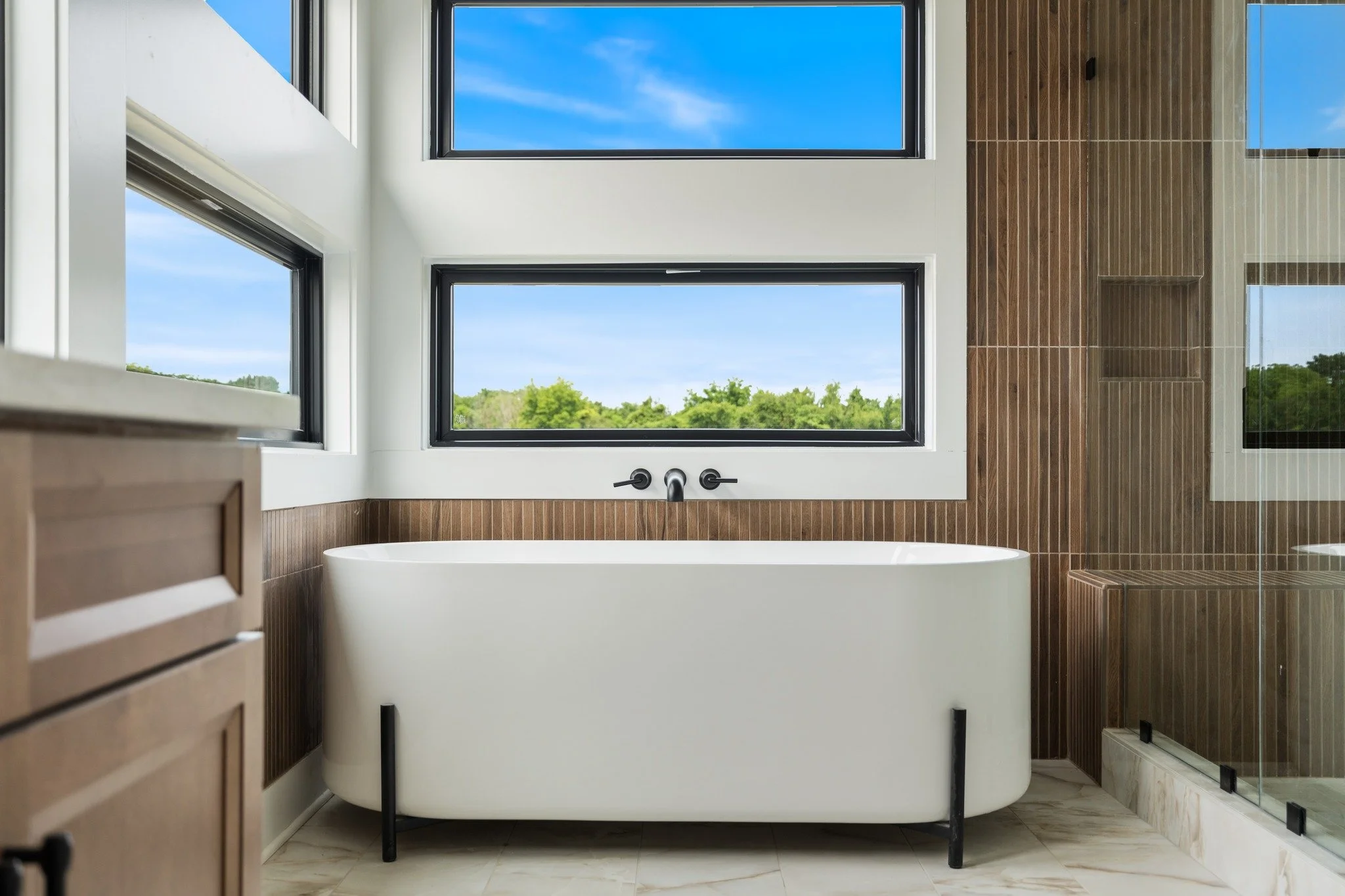 We&rsquo;re getting more requests for modern design, and I love that it invites a little more freedom.

One of the best parts? Having fun with windows. Playing with size, shape, and placement, and letting them become a design feature on their own.
Th