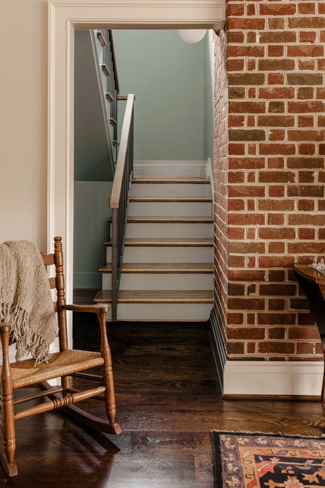 This is where staying involved changes everything.

This staircase and the entire third floor was never part of the original plans. By working closely with the builder during framing, we were able to rethink the space in real time and create an oppor