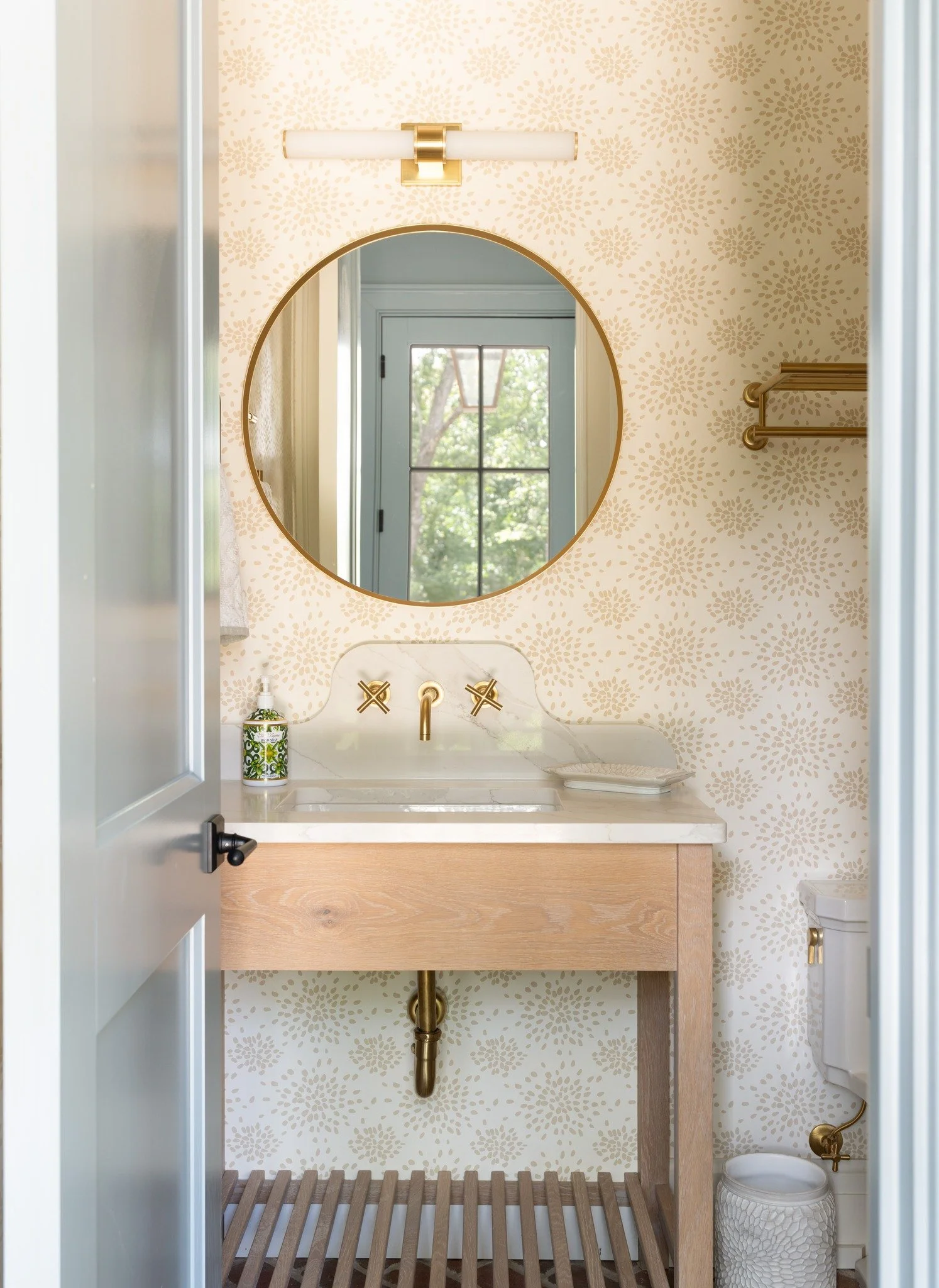 Half baths are simple on paper, but they can be one of the best moments in the house.

This is where homeowners take risks with wallpaper, bold lighting, vanities. Things you wouldn&rsquo;t carry through the entire home but can fully commit to in a s