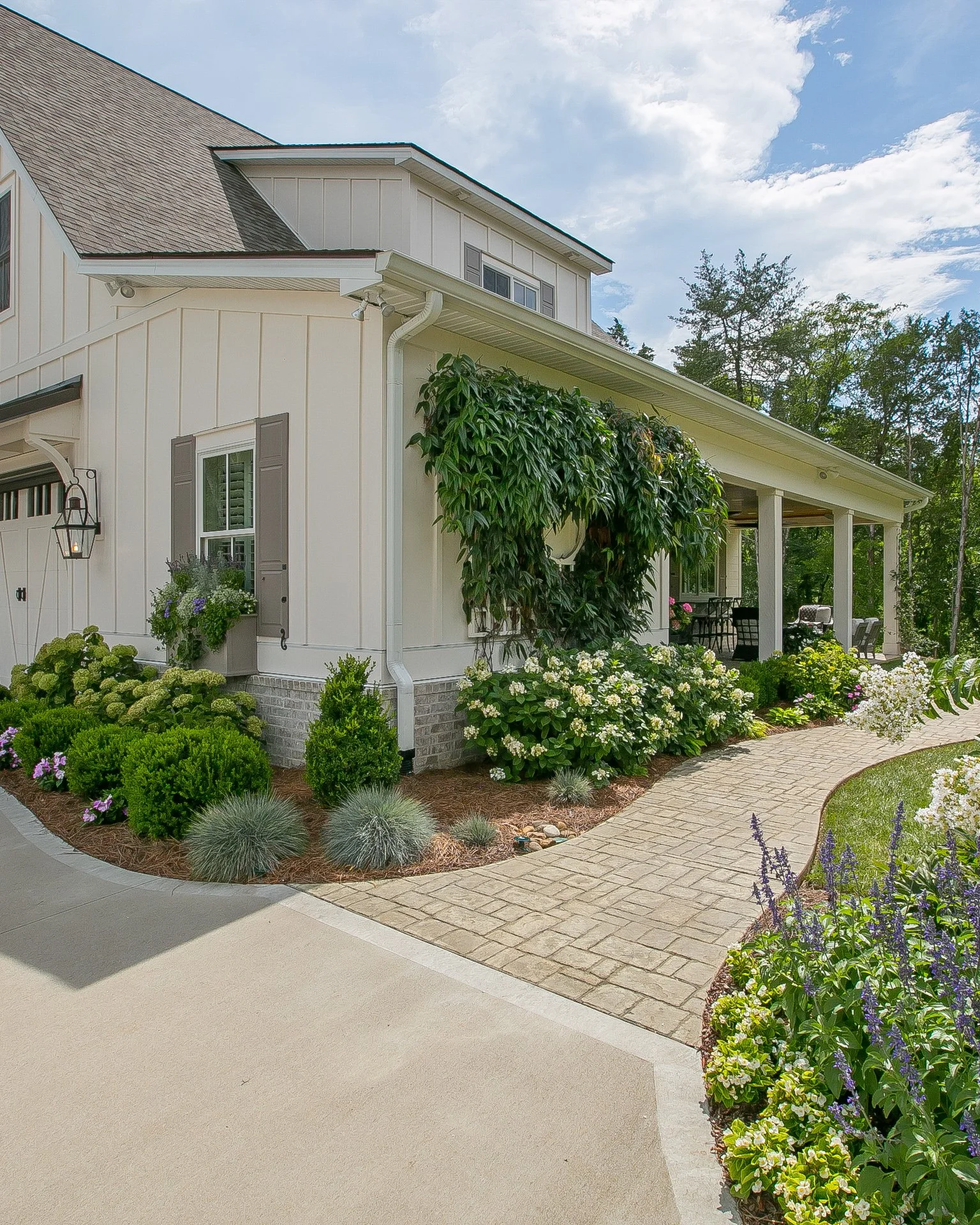 Warmer days are here and this porch is ready for all of them. Morning coffee, evening wine, and everything in between. This pass-through window was made for it. Outdoor living done right. The perfect place for mom to rest on this beautiful Mother's D