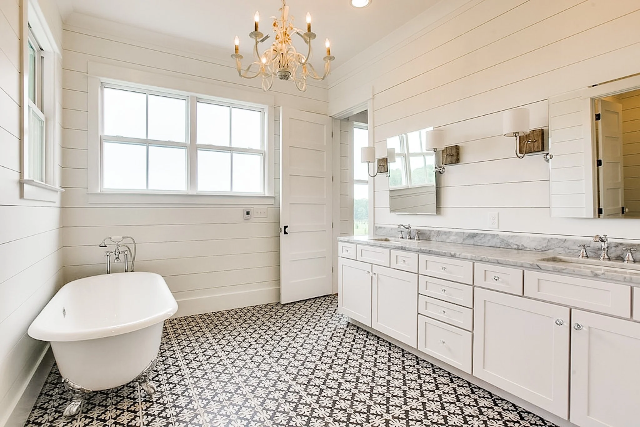When designing a bathroom layout, where does the tub go? Freestanding or built into a tile deck? It sounds simple, but that one decision drives everything; window placement, vanity placement, how the whole room flows. ​​​​​​​​

#jtaylordesigns #custo