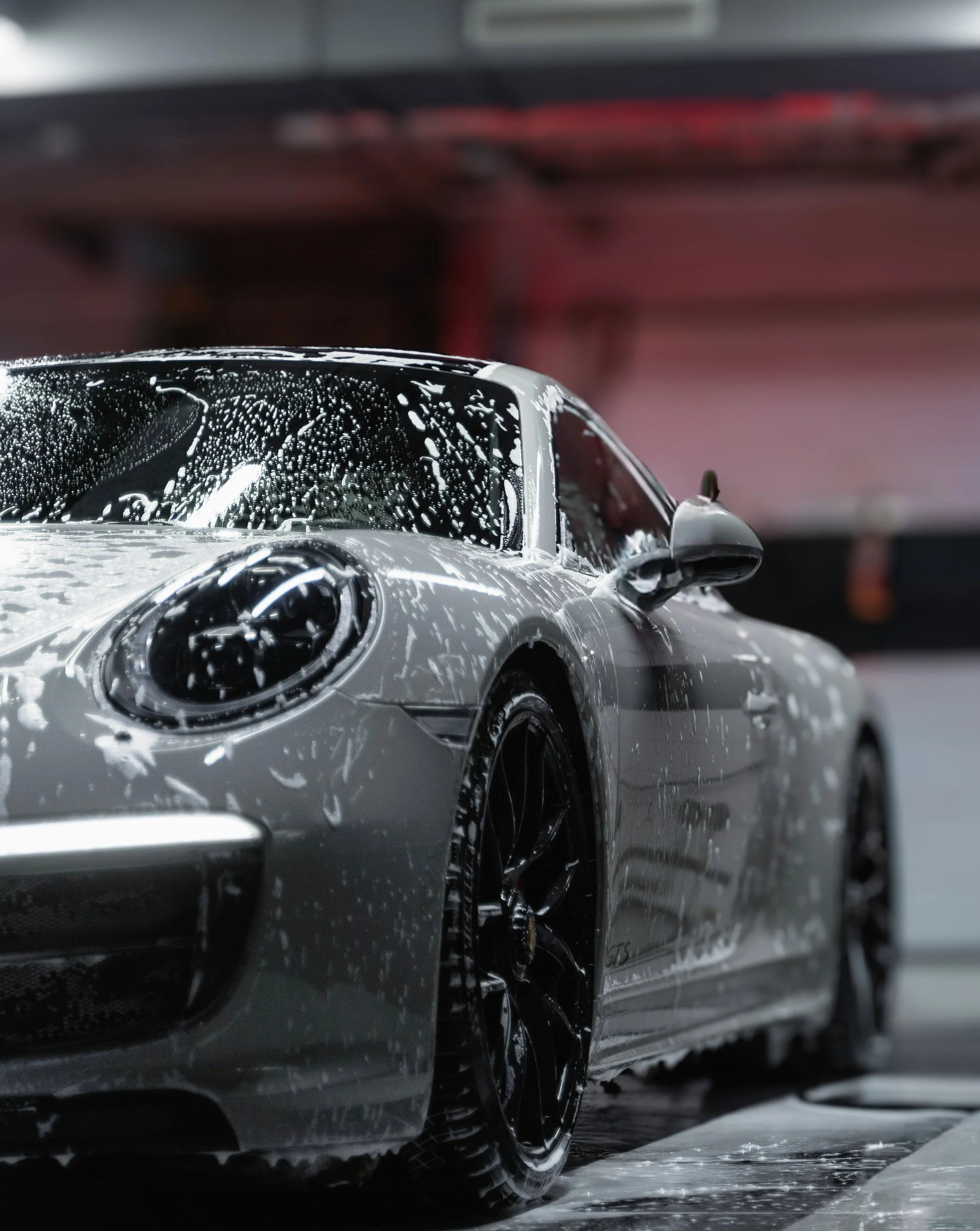 Picture of a soapy Porsche.