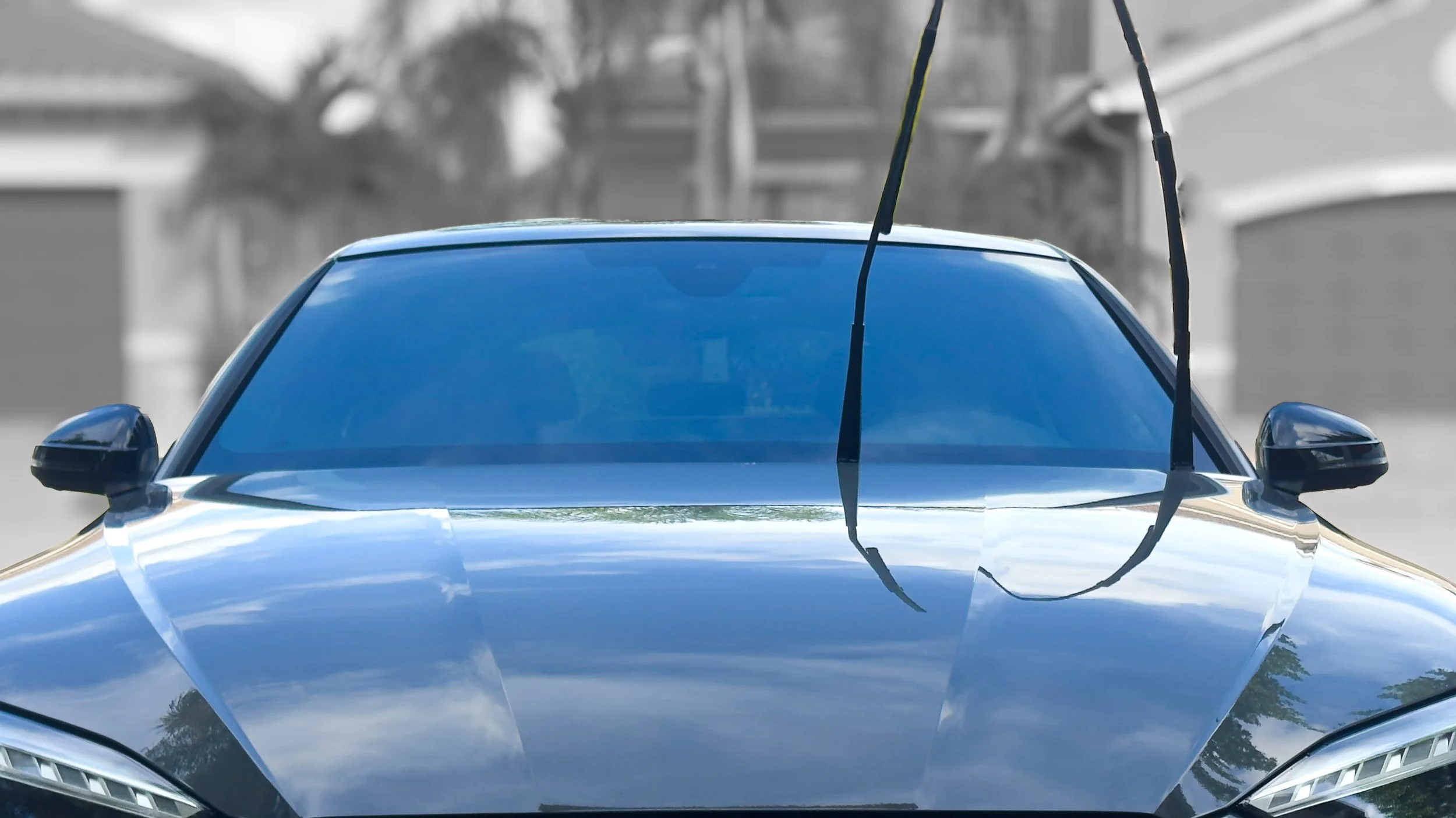 Picture of a car's clean windshield.
