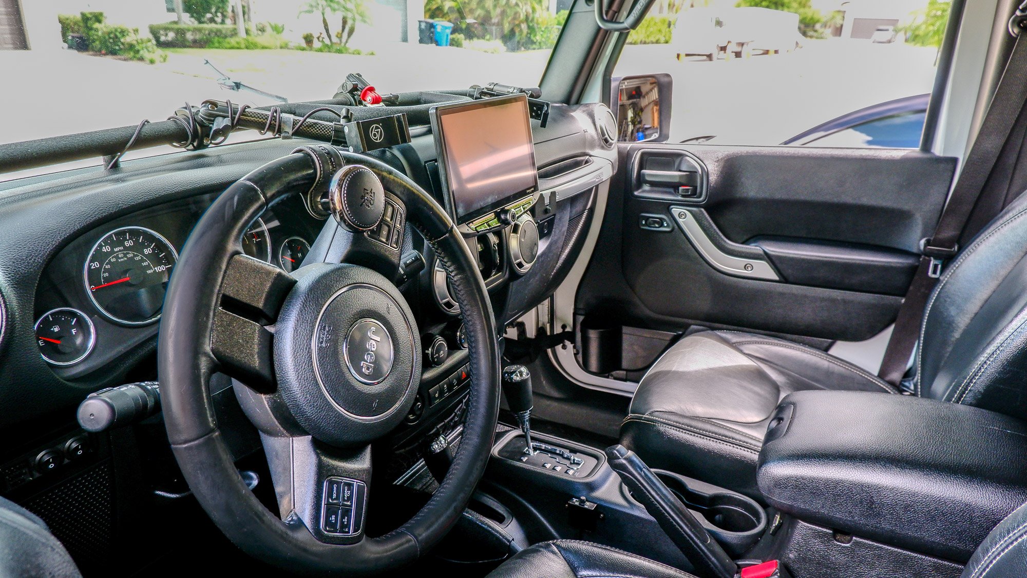 Picture of a clean interior of a Jeep.