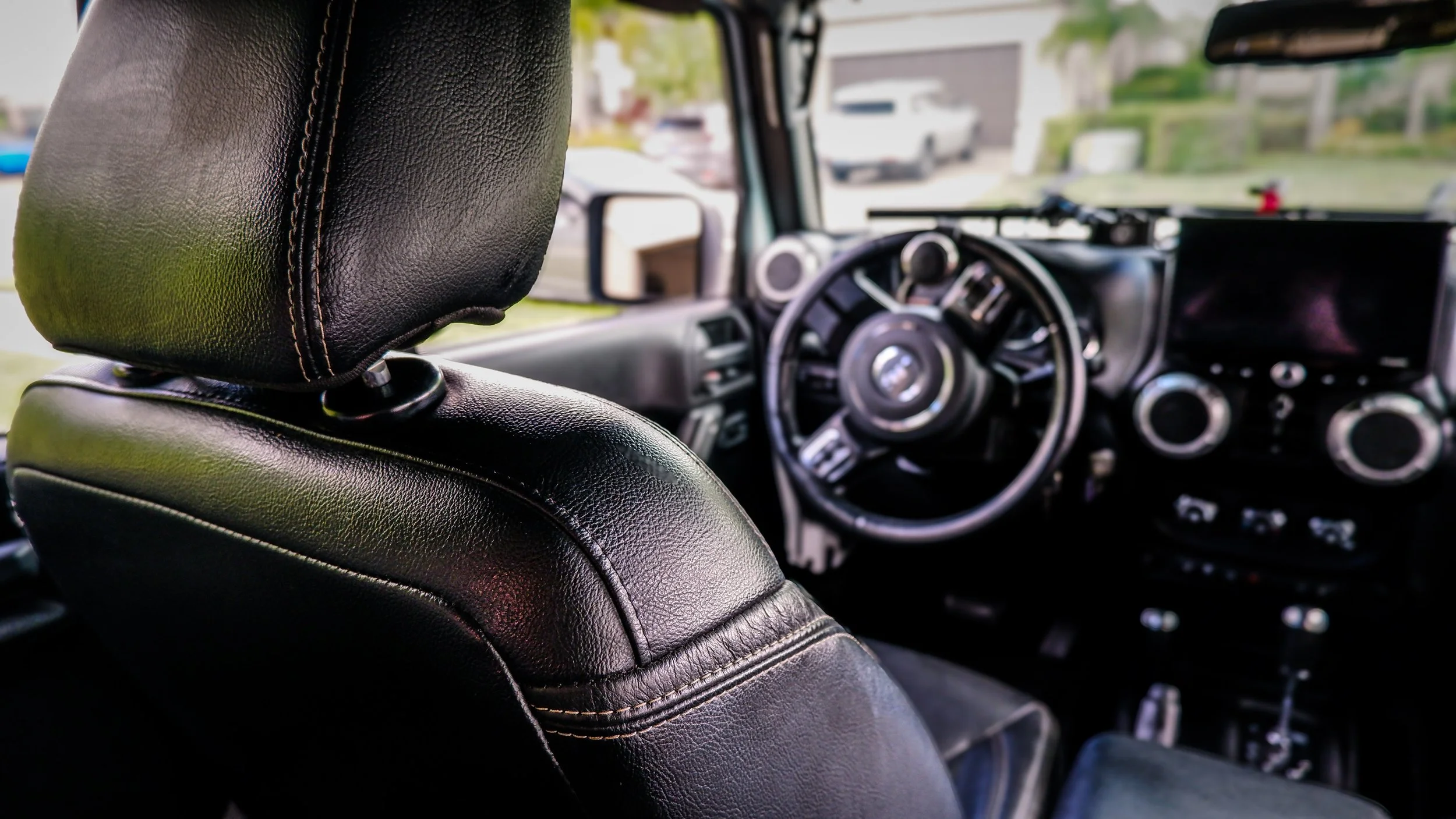 Interior of a clean Jeep.