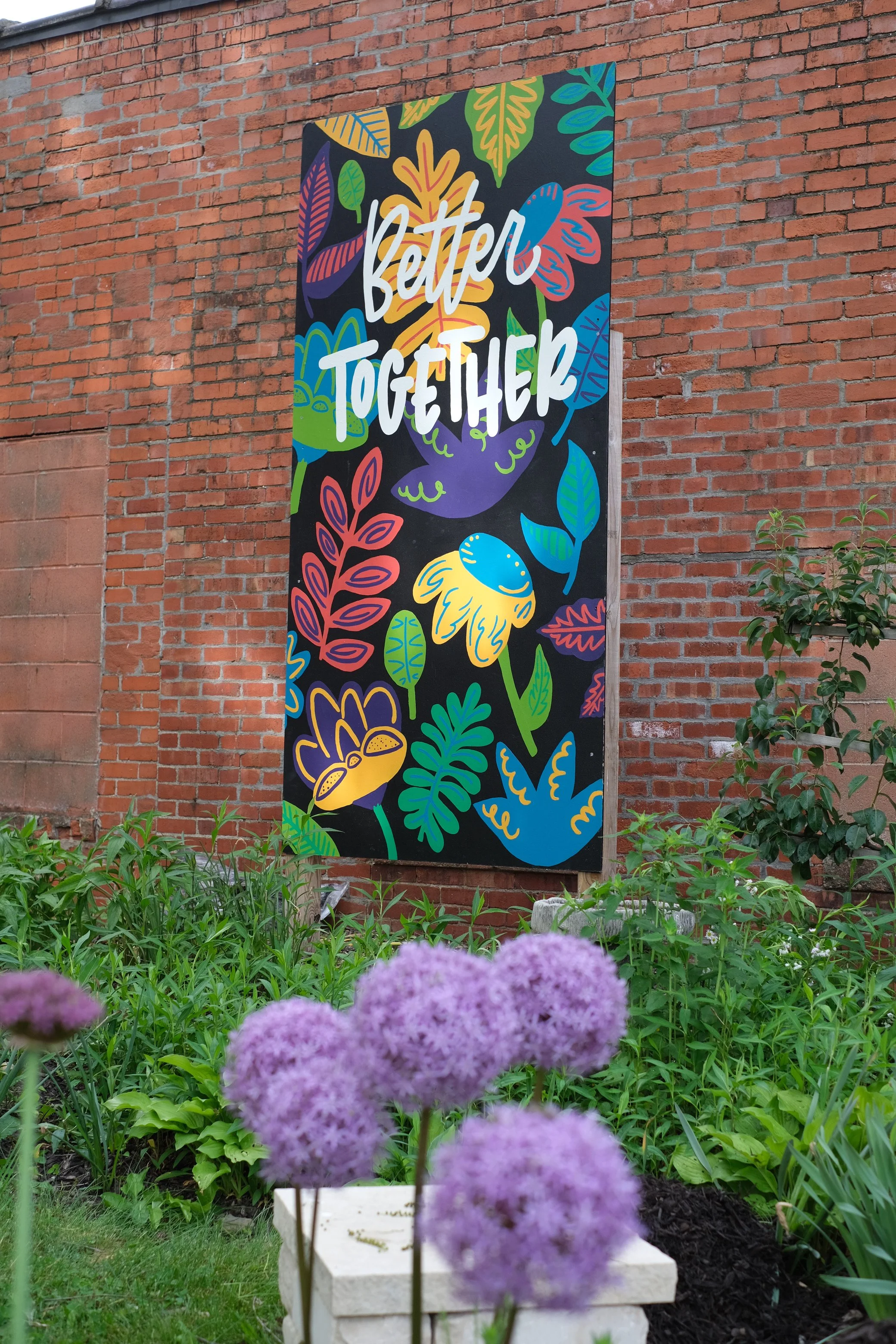 Design, Hand Lettering, and Hand Painted mural panel for the FOH garden