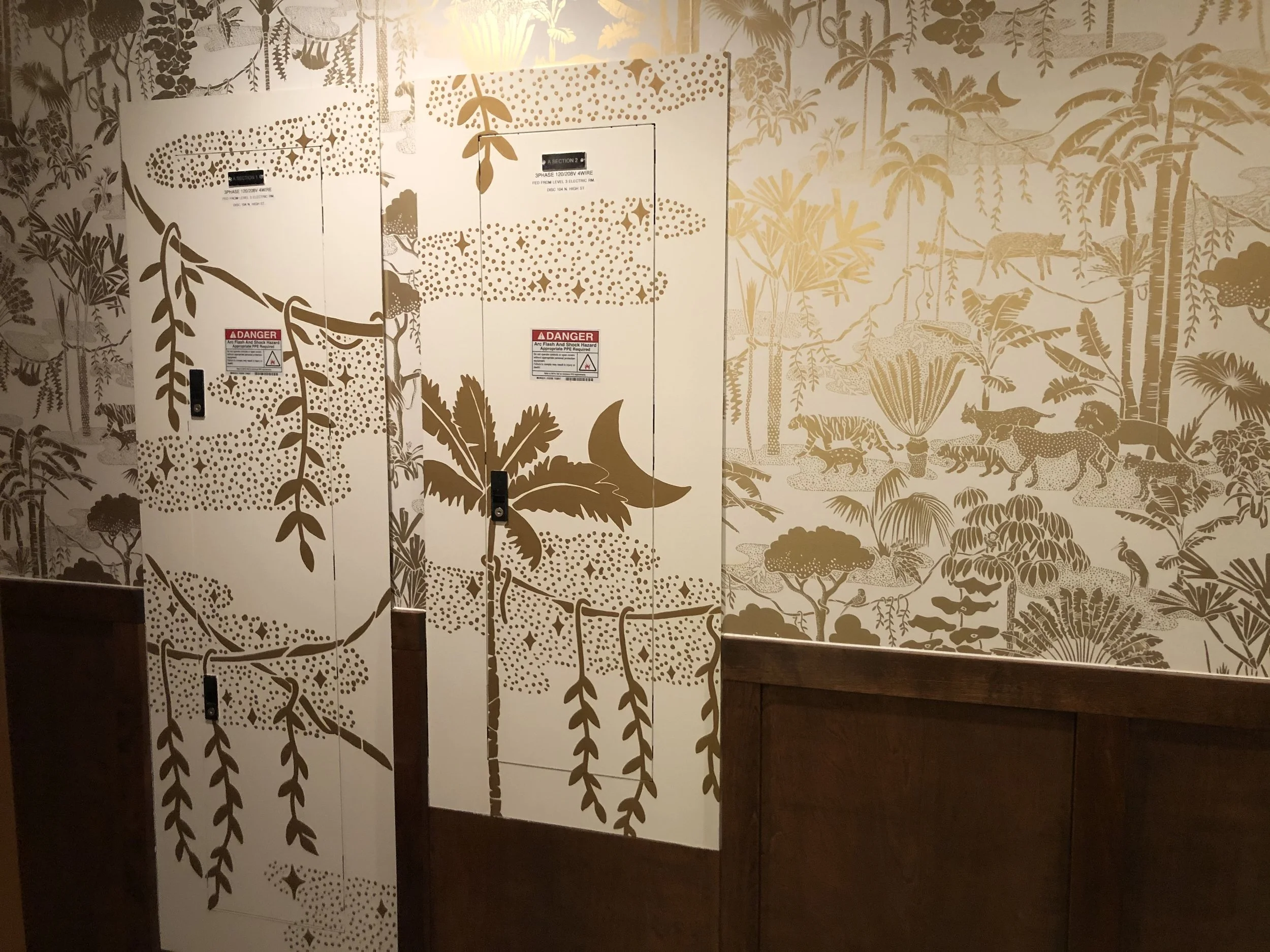 Hand Painted enlarged wallpaper design on electric panels at Getaway Brewing