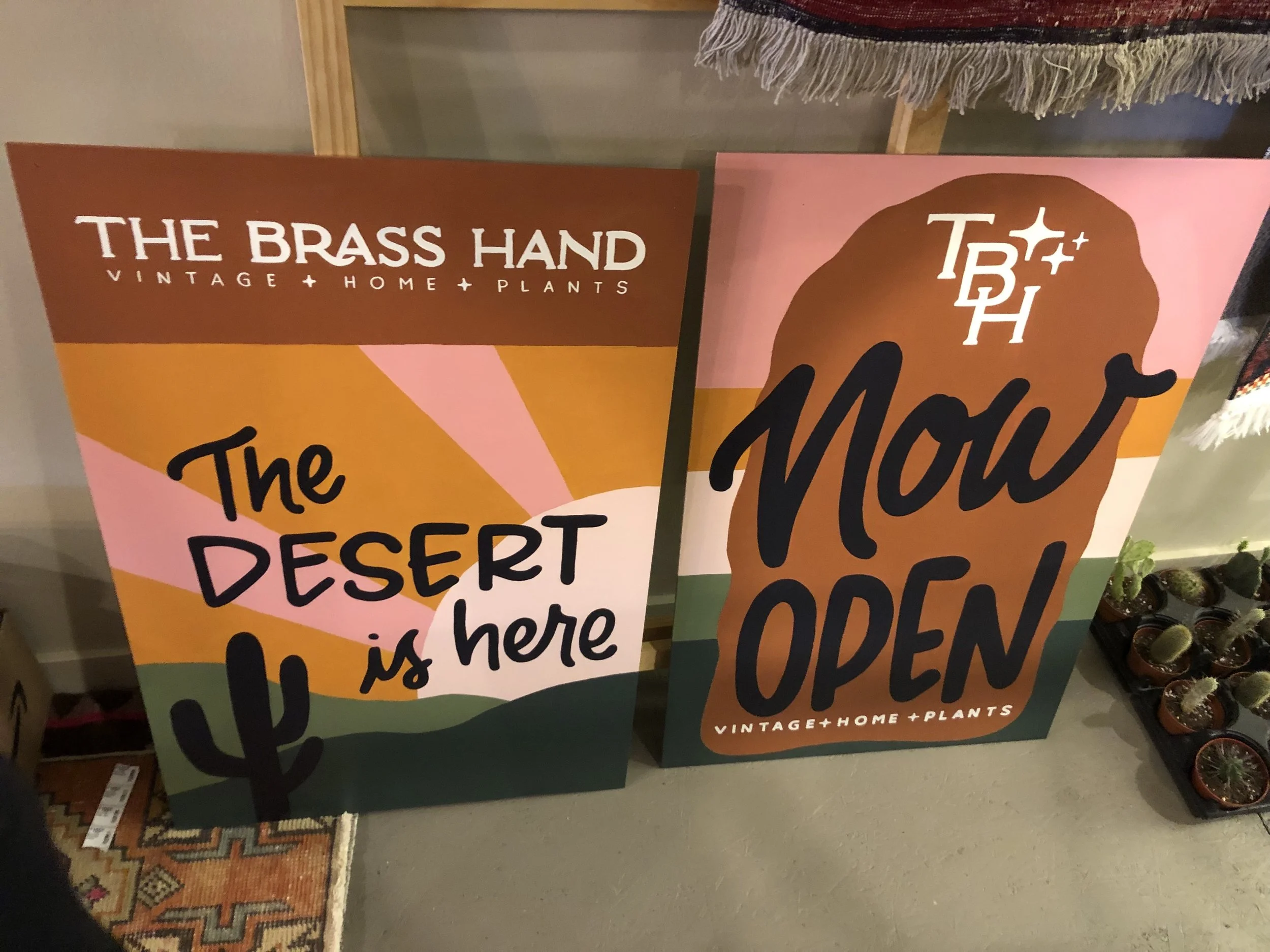 Hand Lettered signs for The Brass Hand sidewalk sign