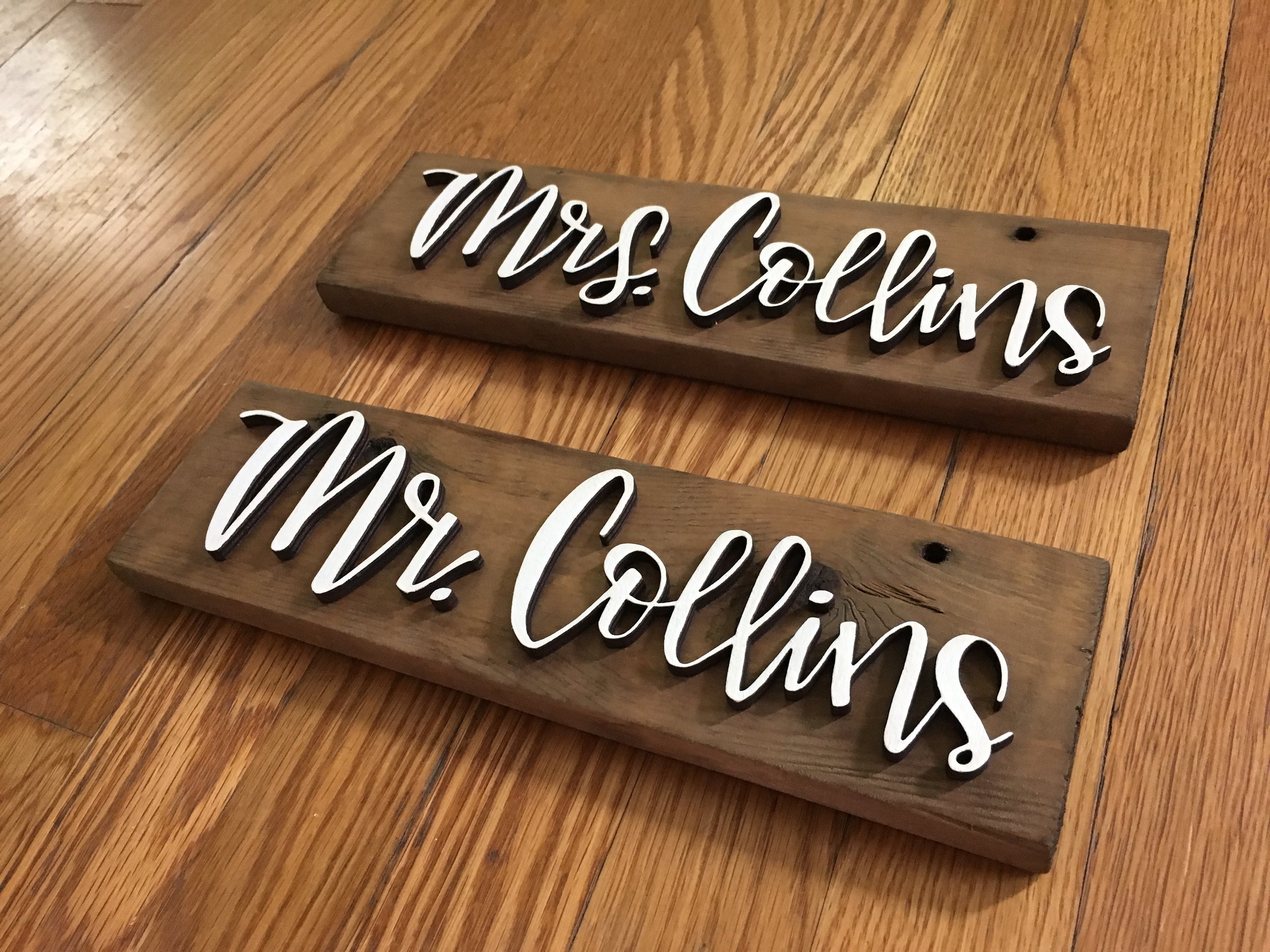 Hand Lettering laser cut out of wood; affixed to signs