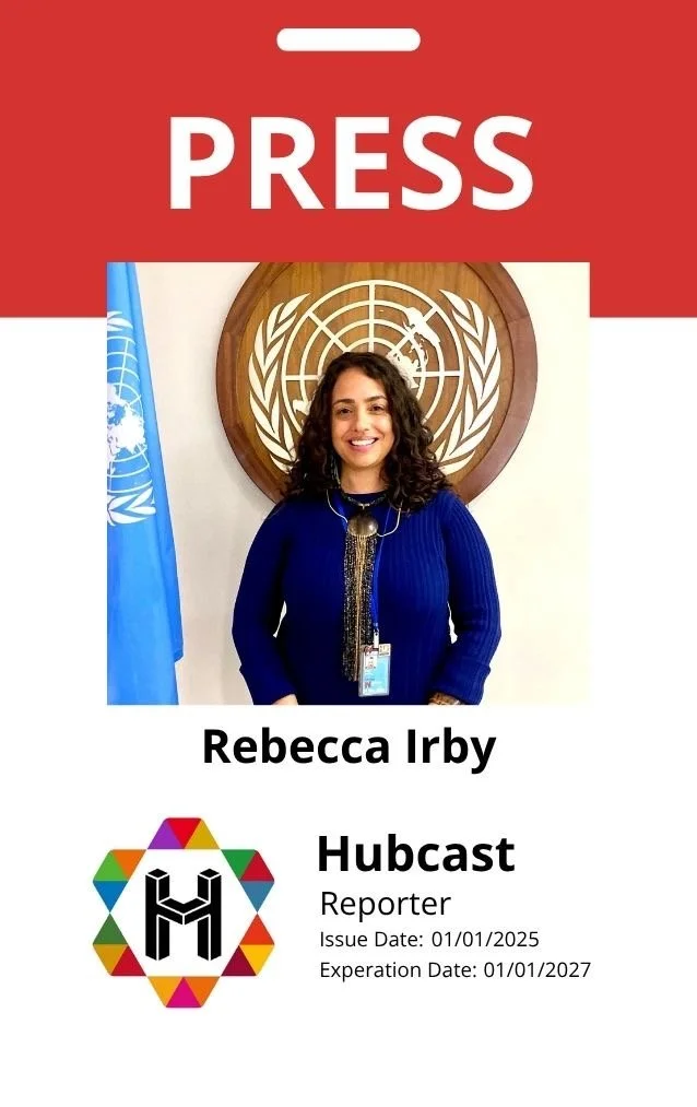 Press badge featuring a photo of Rebecca Irby, standing in front of a United Nations emblem, with the text 'Rebecca Irby', 'Hubcast', and 'Reporter', along with issue and expiration dates.