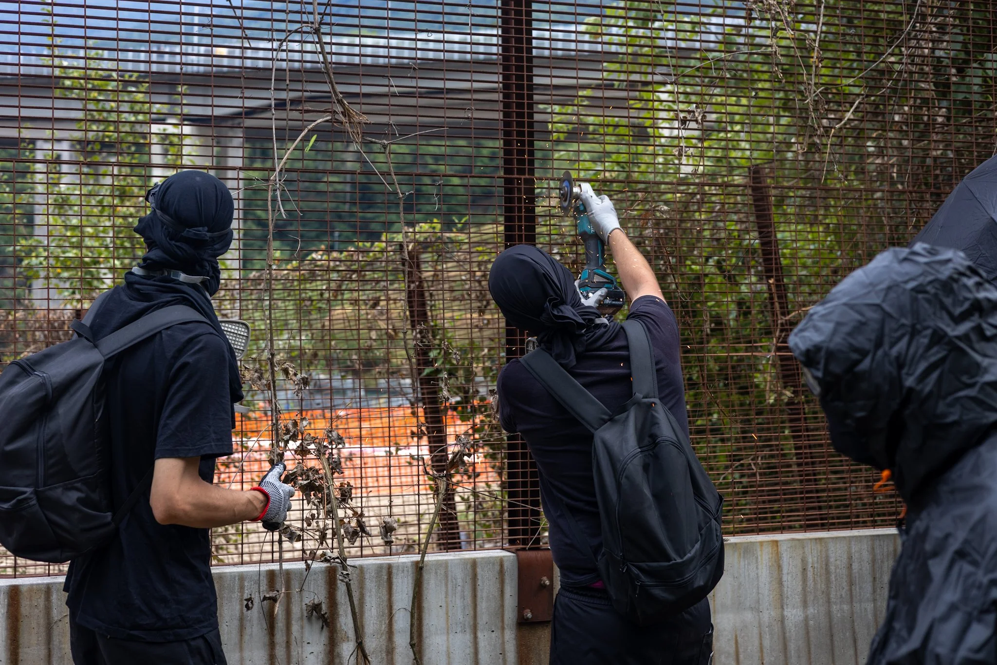 Chiomonte, Italy – July 25, 2026: No Tav protest: Black Bloc open the fences at the Chiomonte construction site to break through