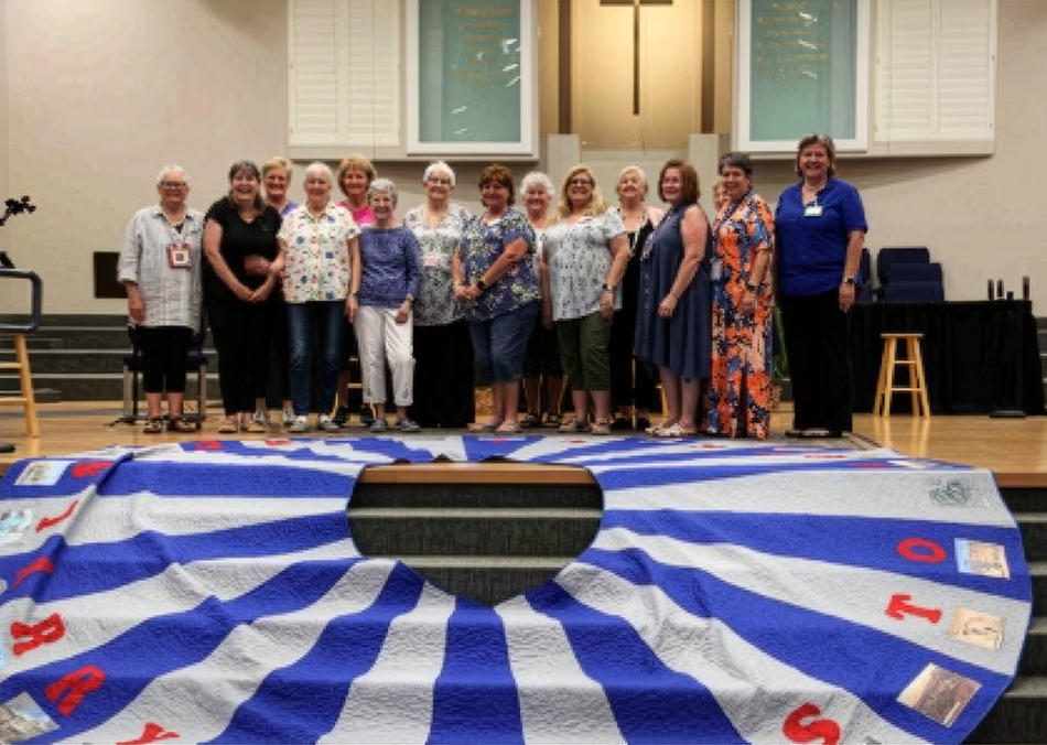 15-foot National Capitol Tree Skirt made from 28 alternating panels of blue and gray fabric. Each panel features a unique image representing Nevada’s culture, wildlife, landscapes, and history.  