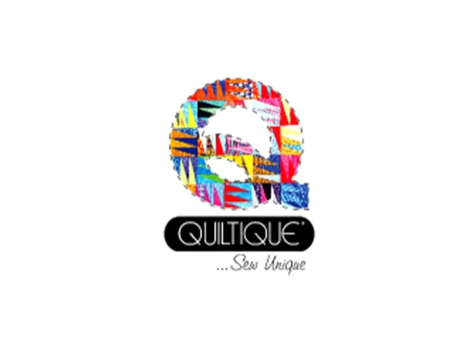 Colorful logo with a stylized letter 'Q' made of various colorful fabric patterns, with 'QUILTique' and the tagline 'Seas Unique' underneath.