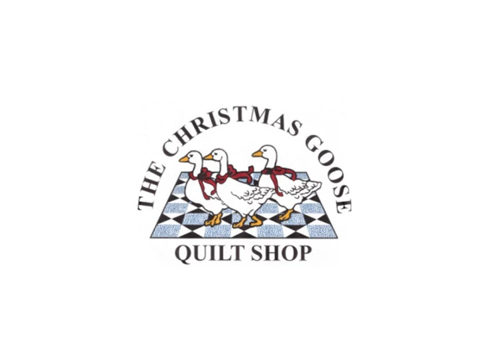 Logo for The Christmas Goose Quilt Shop featuring three geese with red scarves standing on a checkered floor with black and white tiles.