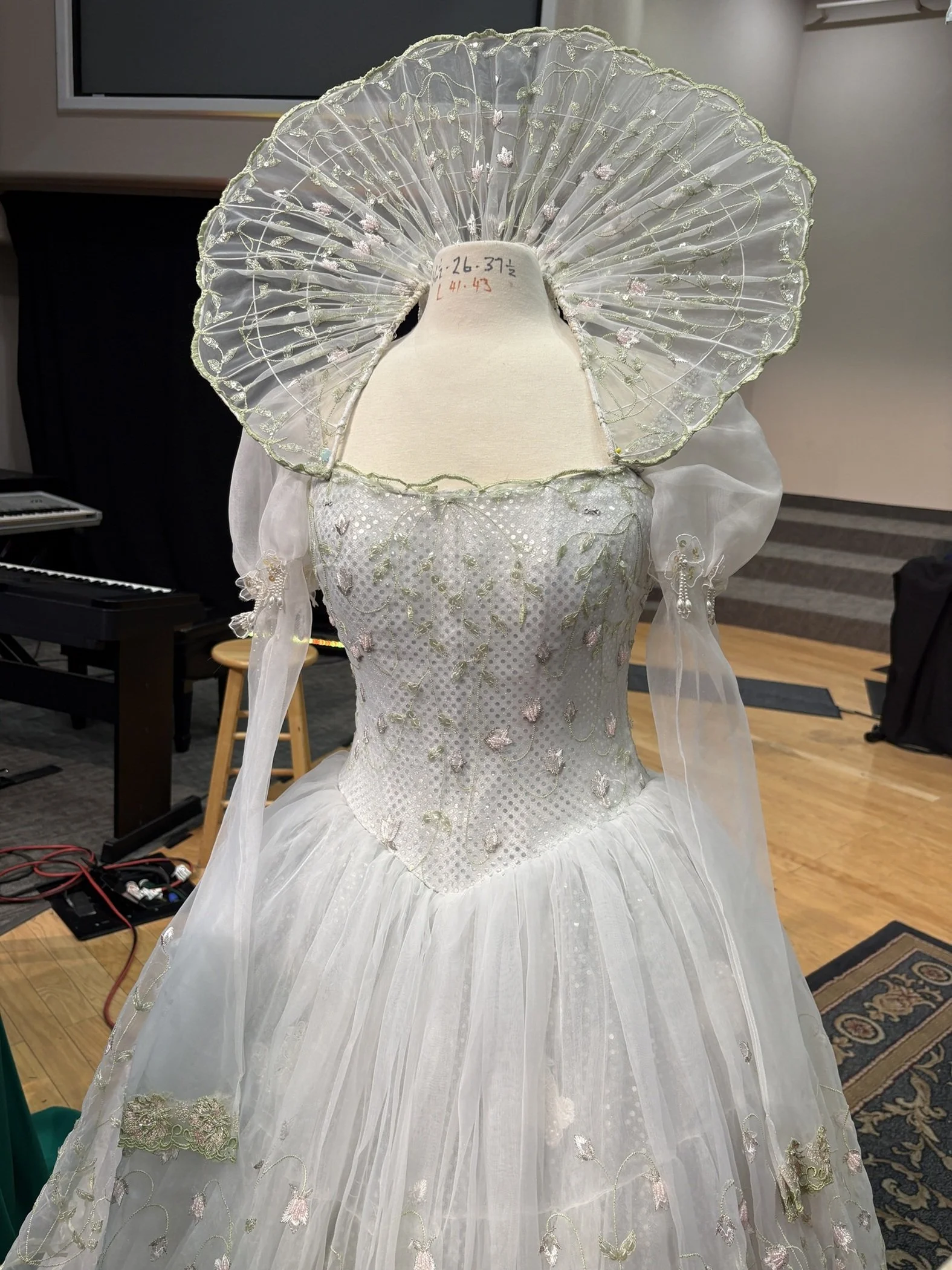 Front view of the Glenda the Good Witch gown, highlighting the whimsical collar and delicately embellished bodice designed for the soap opera Passions.