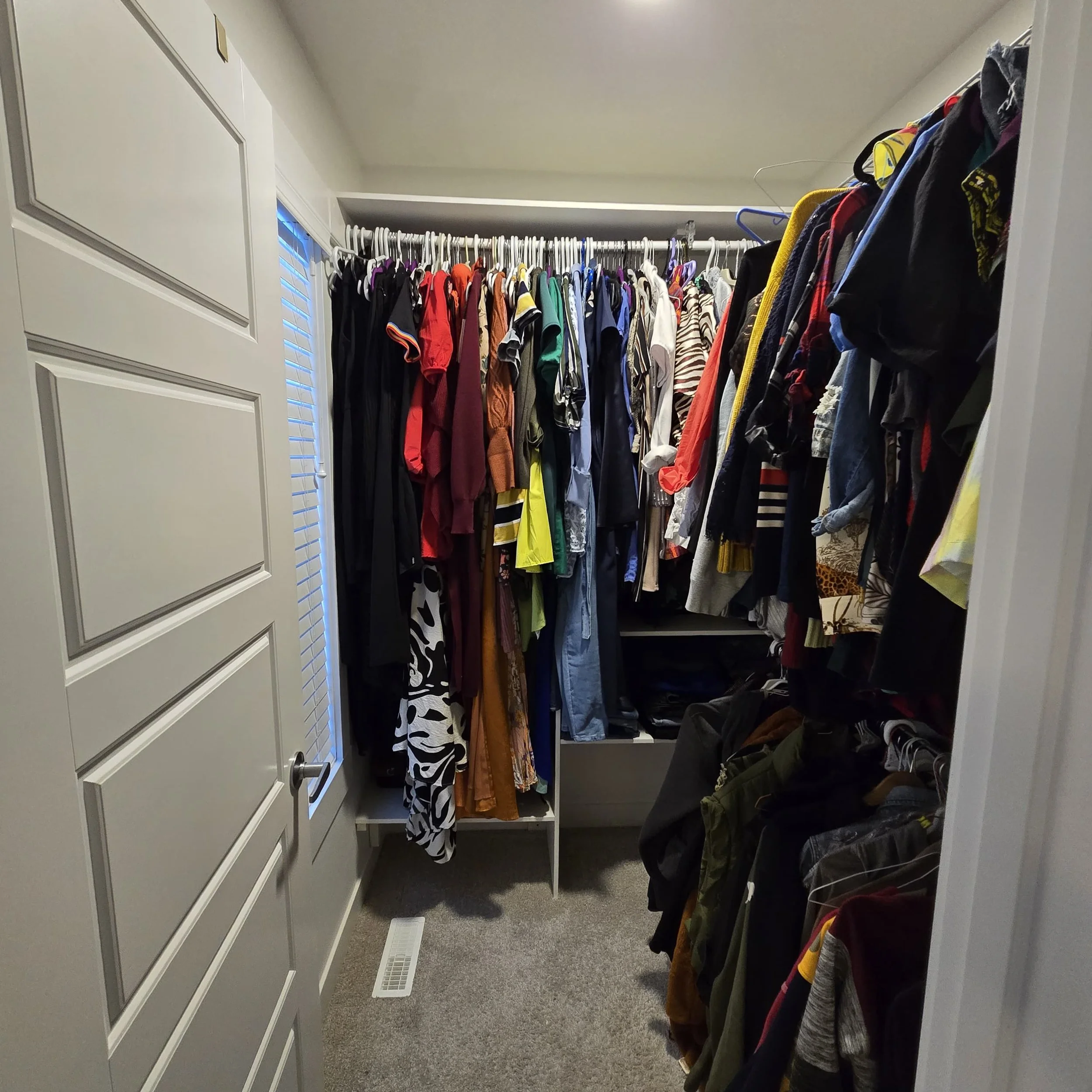 professional organizing master bedroom closet.jpg