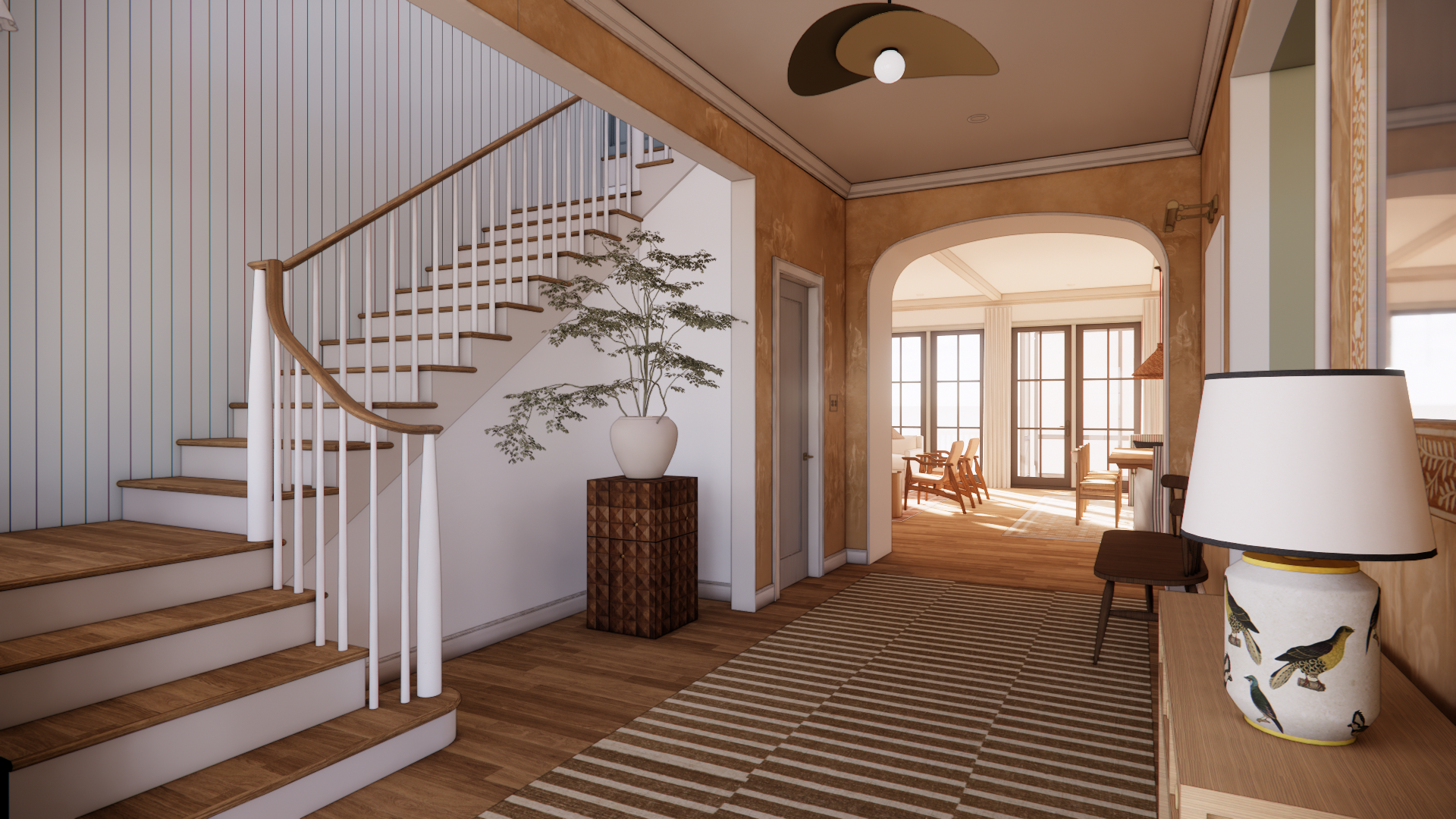 Golden custom mural wallpaper with curved designer staircase and custom millwork archway entry hall