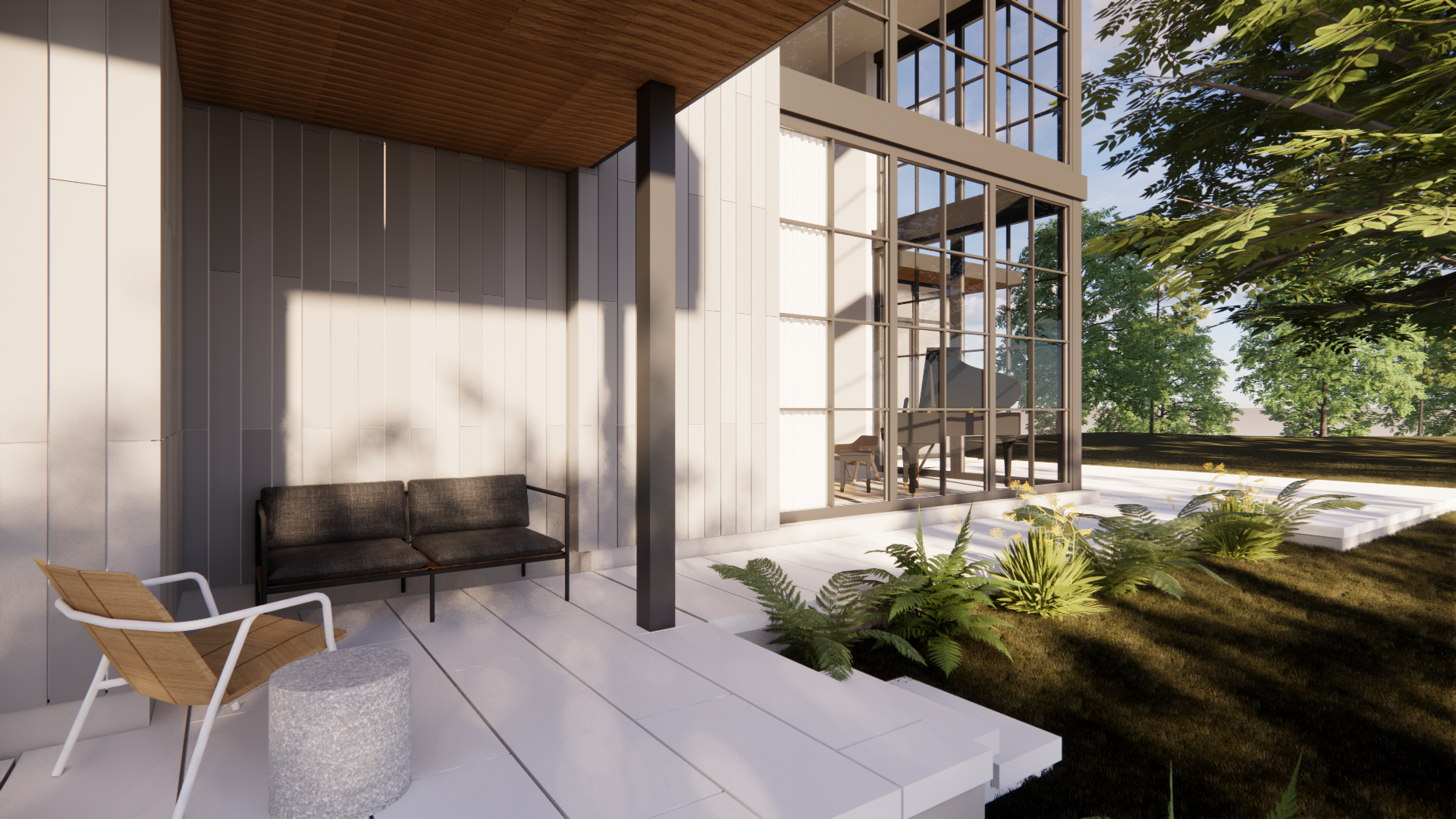 Modern waterfront house in the Northern Neck of Virginia cement board clad exterior with outdoor seating area, glass walls, surrounding greenery, and a garden in daylight.