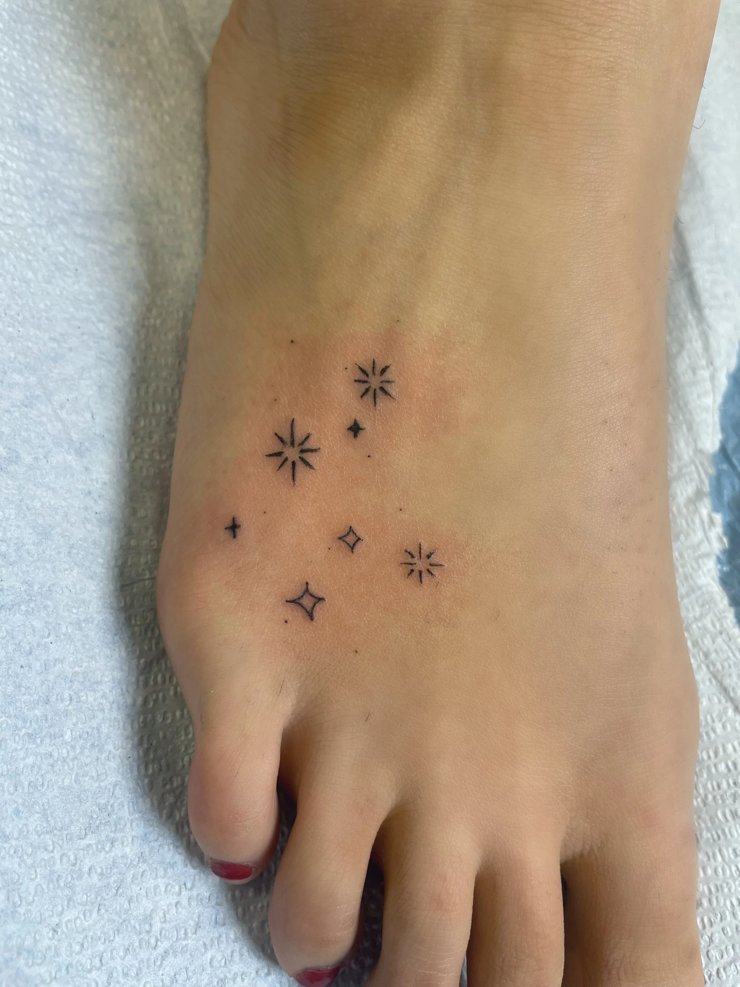 Tiny star tattoos on foot Shelton CT