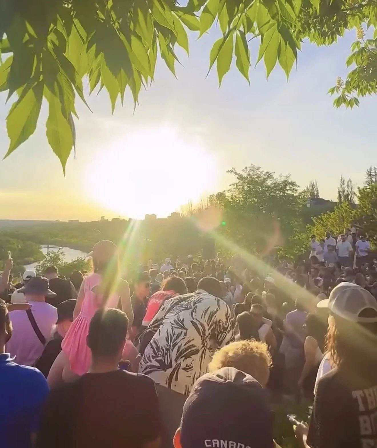 Dos Leches community event at sunset along the river in Calgary
