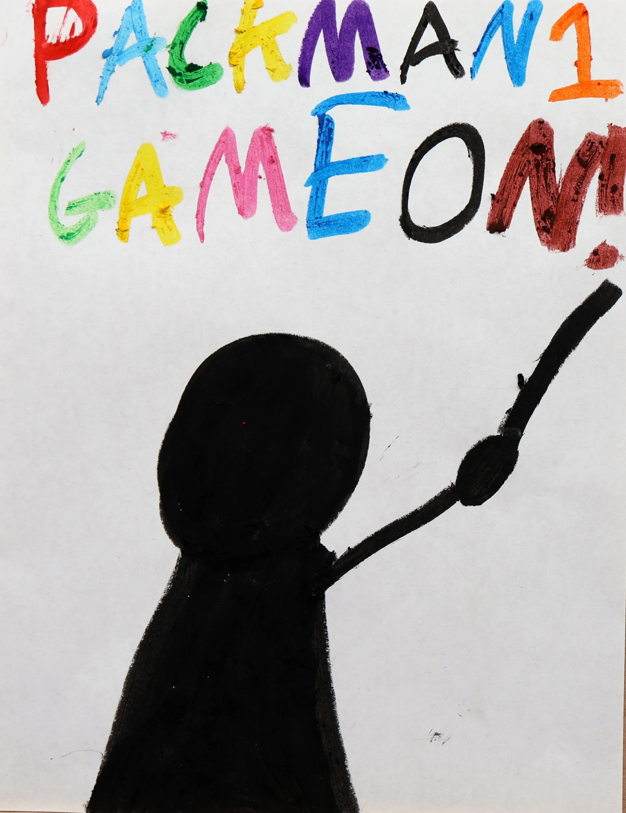 A drawing of a person in black silhouette raising one arm, with the words 'PACKMAN GAME ON!' written in colorful letters above.