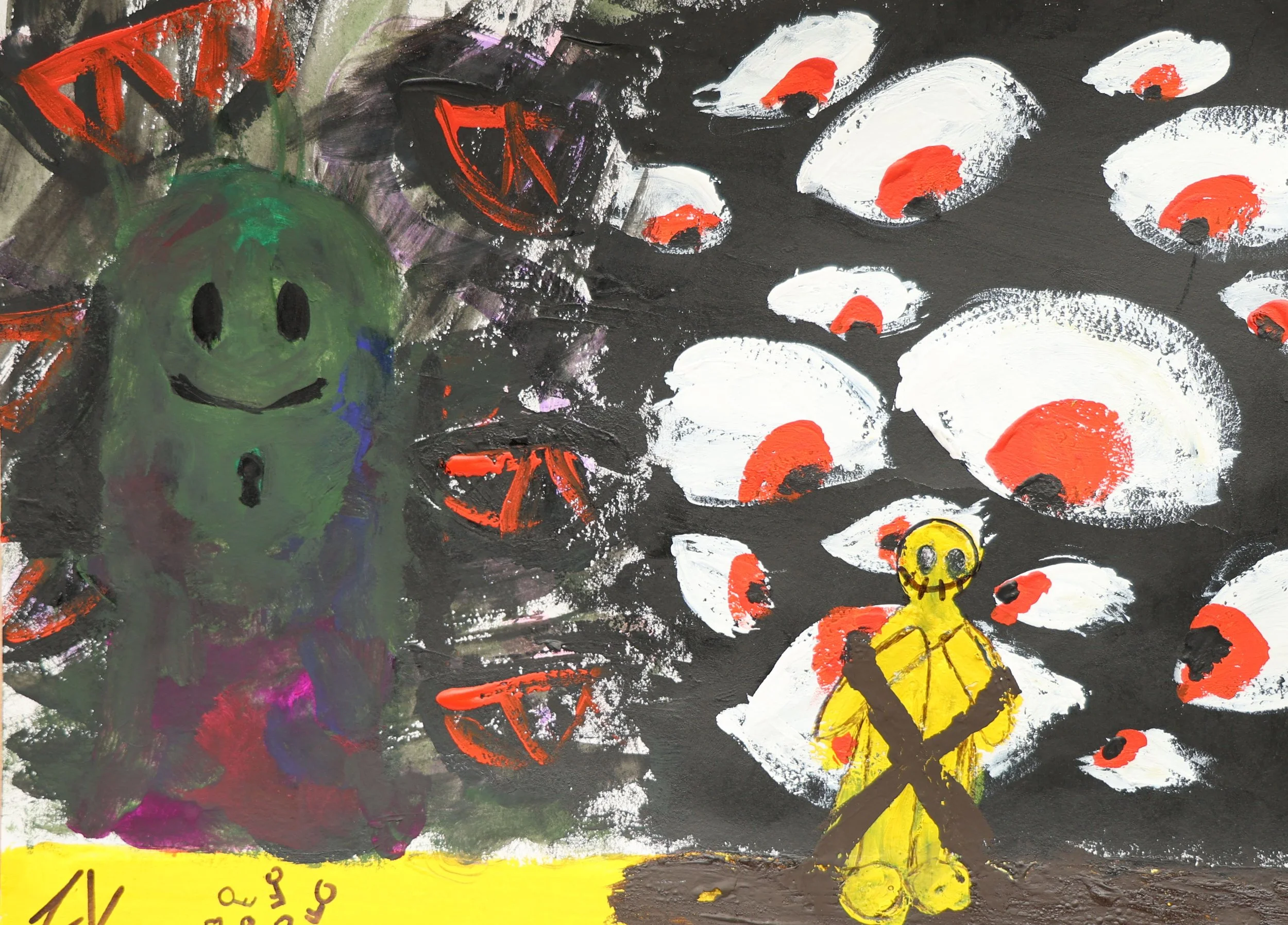 Child's painting depicting a green smiling creature with black eyes and mouth, surrounded by orange and red shapes resembling flowers or ships on a black background, with a small yellow figure with black eyes and crossed arms in the lower right corne