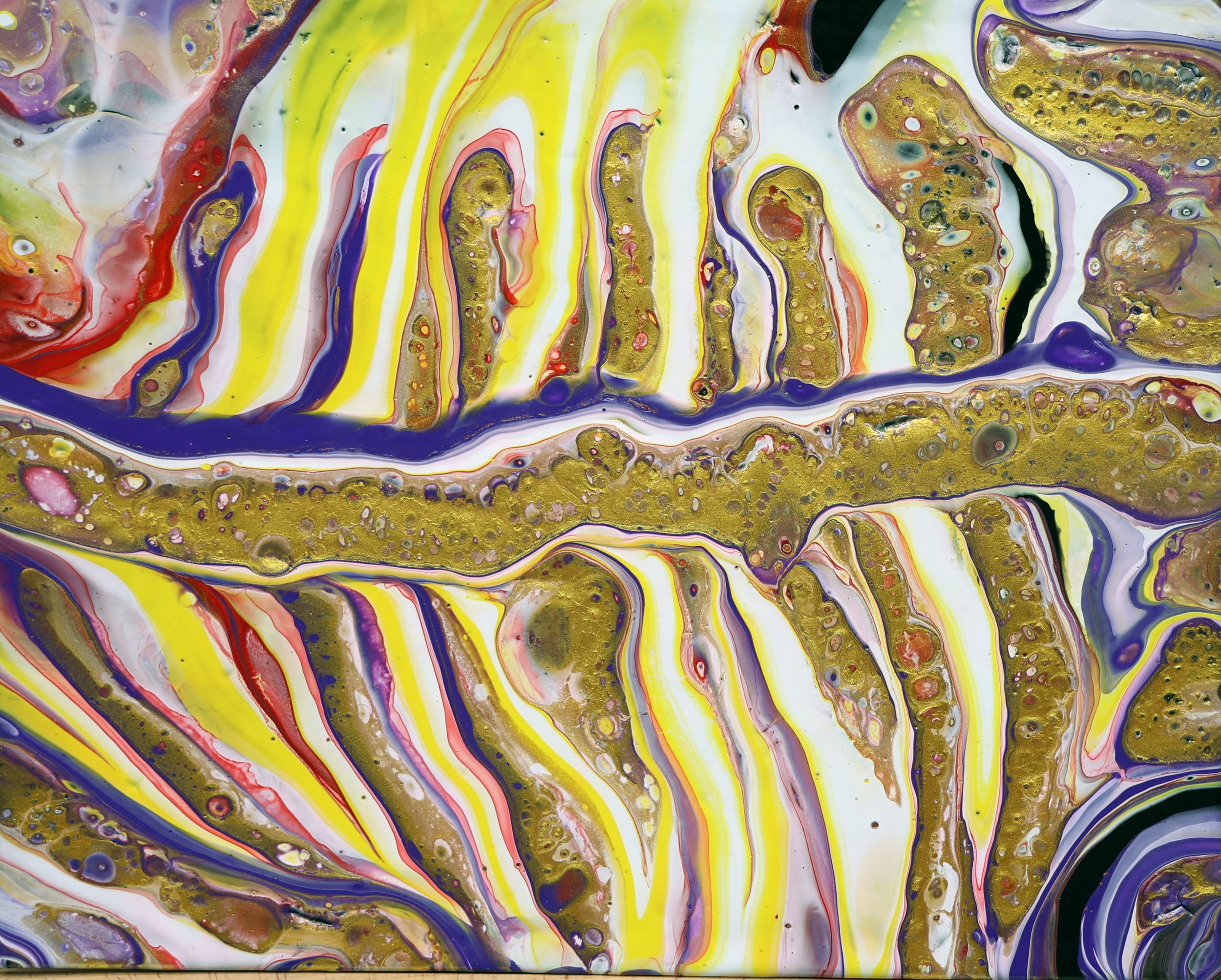 Abstract colorful fluid art with yellow, purple, red, white, and metallic gold streaks and bubbles.