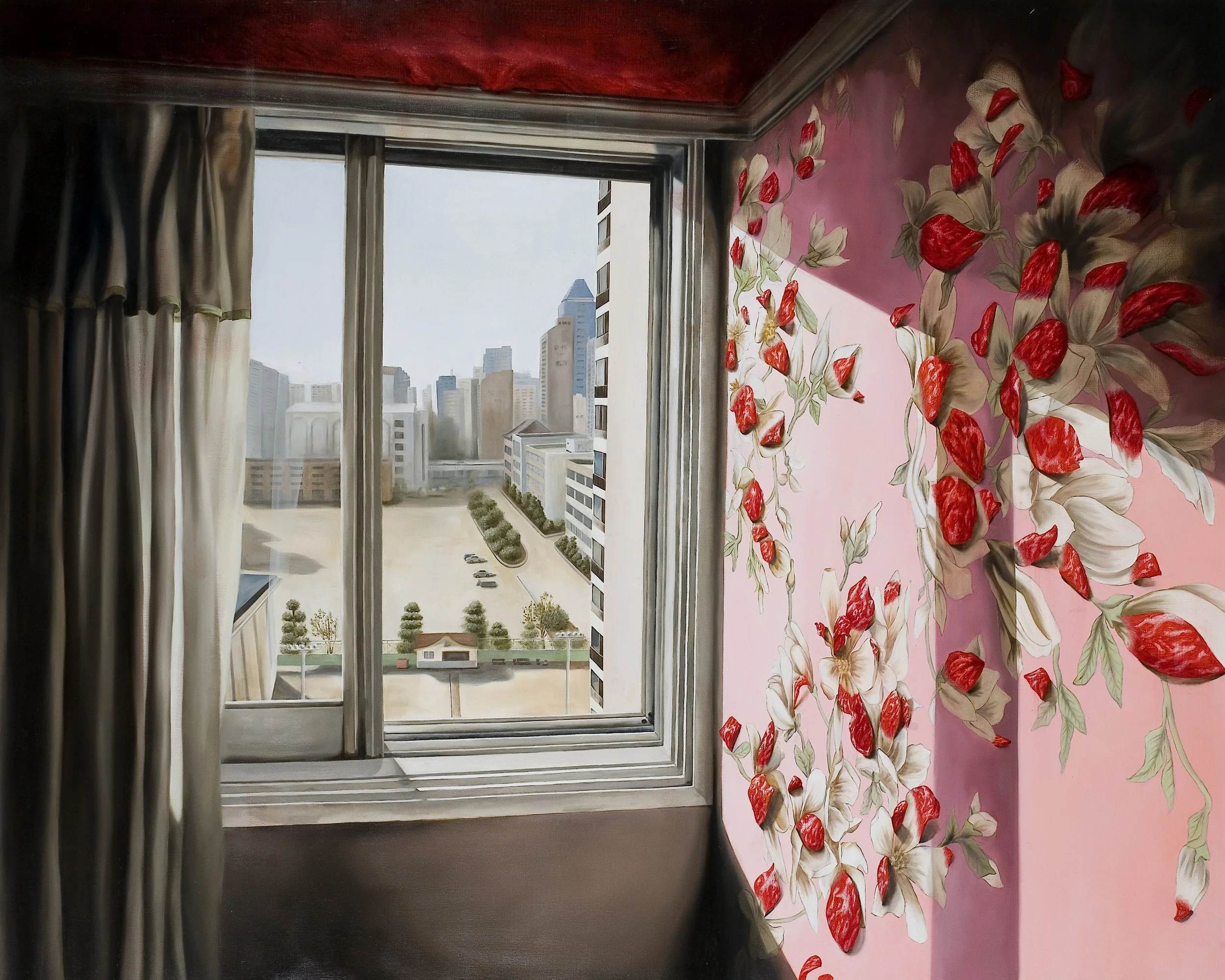 View of a city skyline through a window with closed curtains, pink wall with floral mural on right side.
