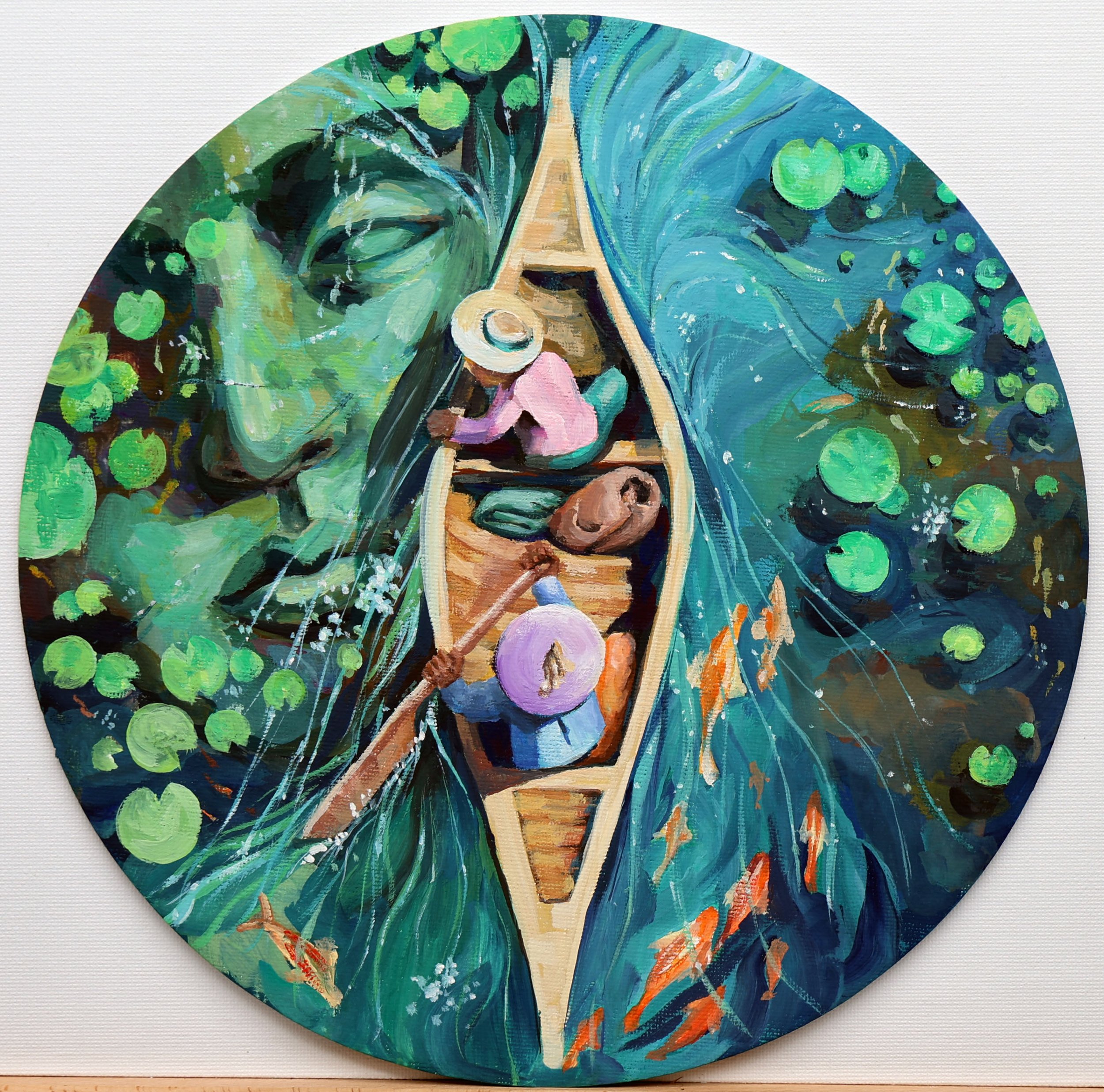 A circular painting depicting a boat on water, with two people paddling, surrounded by green lily pads and aquatic plants.