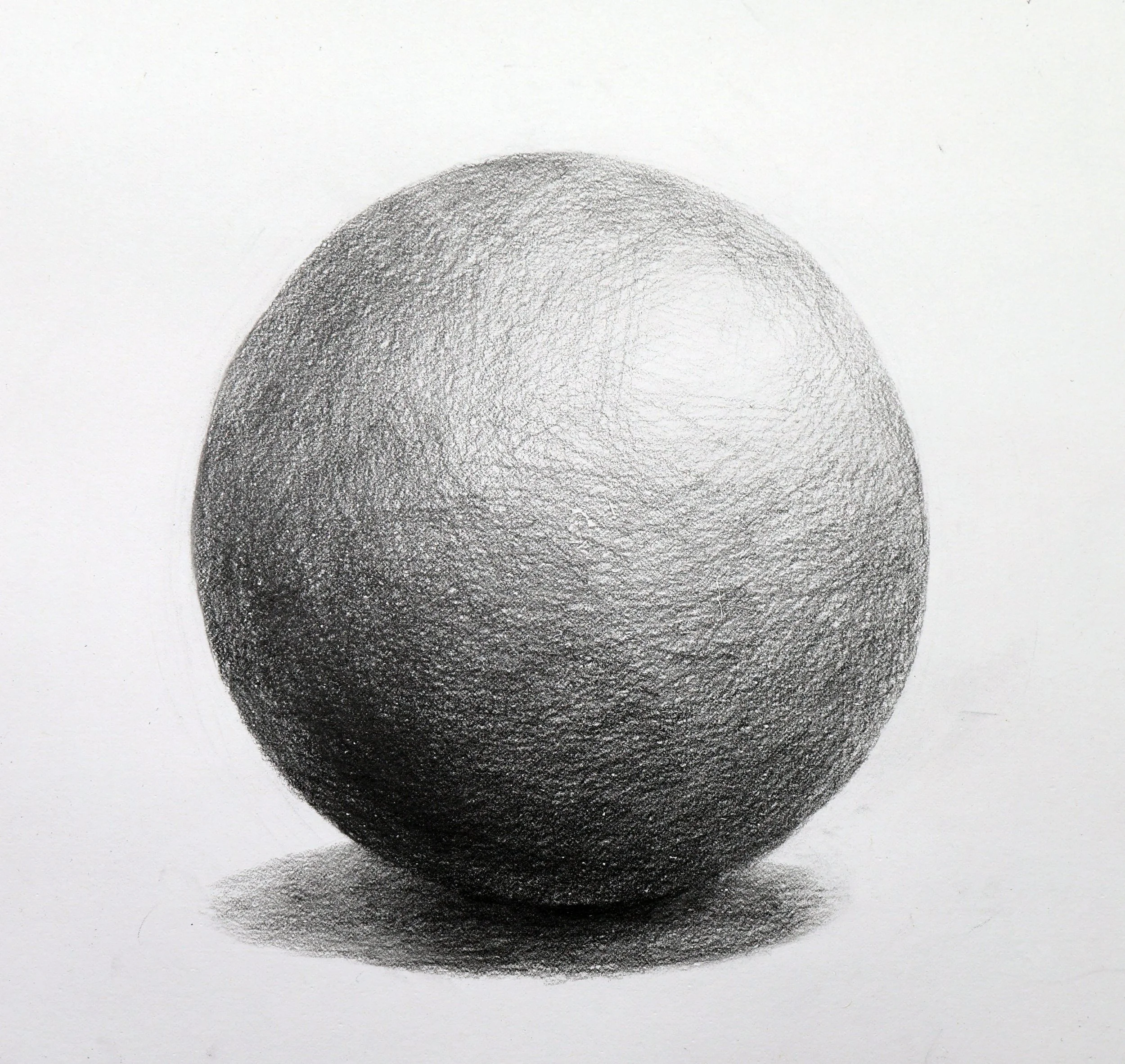 A detailed pencil drawing of a spherical object resembling an orange, with textured shading and shadowing to give it a three-dimensional appearance.